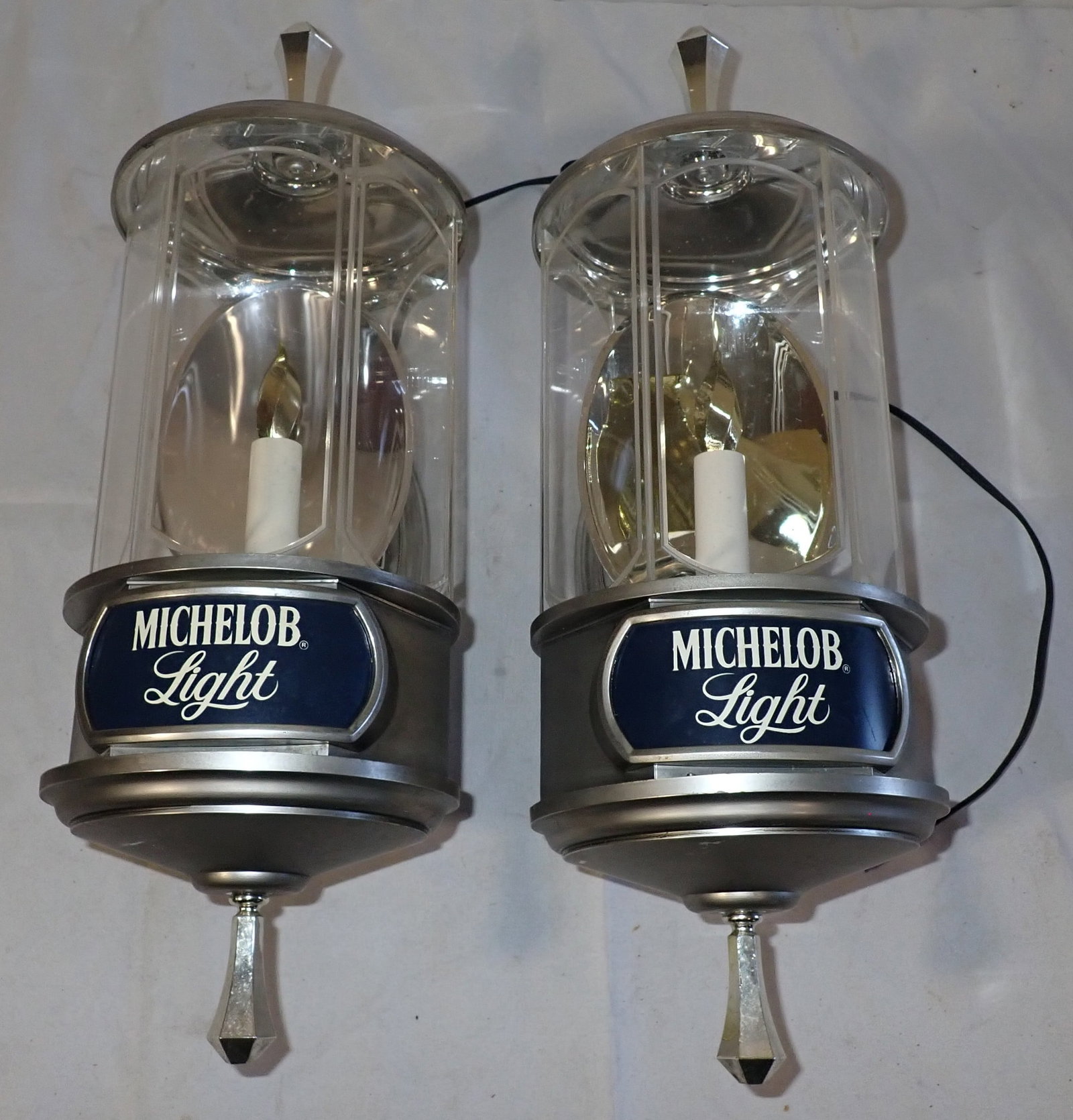 Michelob Animated Bar Signs: Approx 6 3/4" in diameter and 18 1/2" long. These do not light up. The Candle tip rotates. Shipping available ($20 handling charge, plus postage)