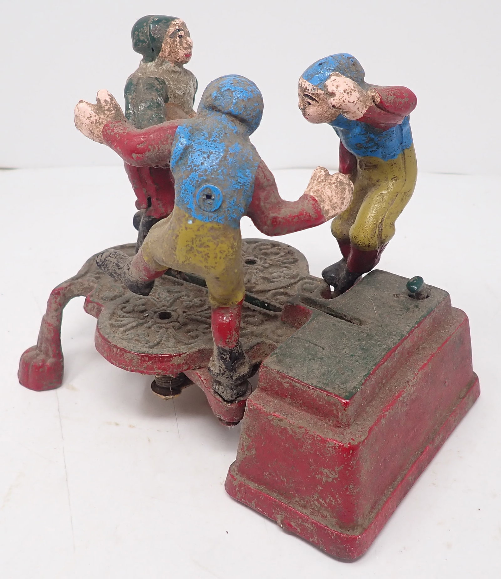Cast Iron Football Players Mechanical Bank: Repro bank is Apprx 4 3/4" x 7 1/4" x 6 1/4" tall. Shipping available