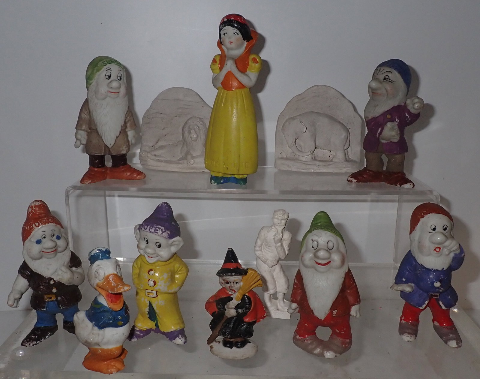 Snow White and Seven Dwarfs Figures w/ Misc: Tallest is apprx 5 3/8" tall. Shipping available ($20 handling charge, plus postage)