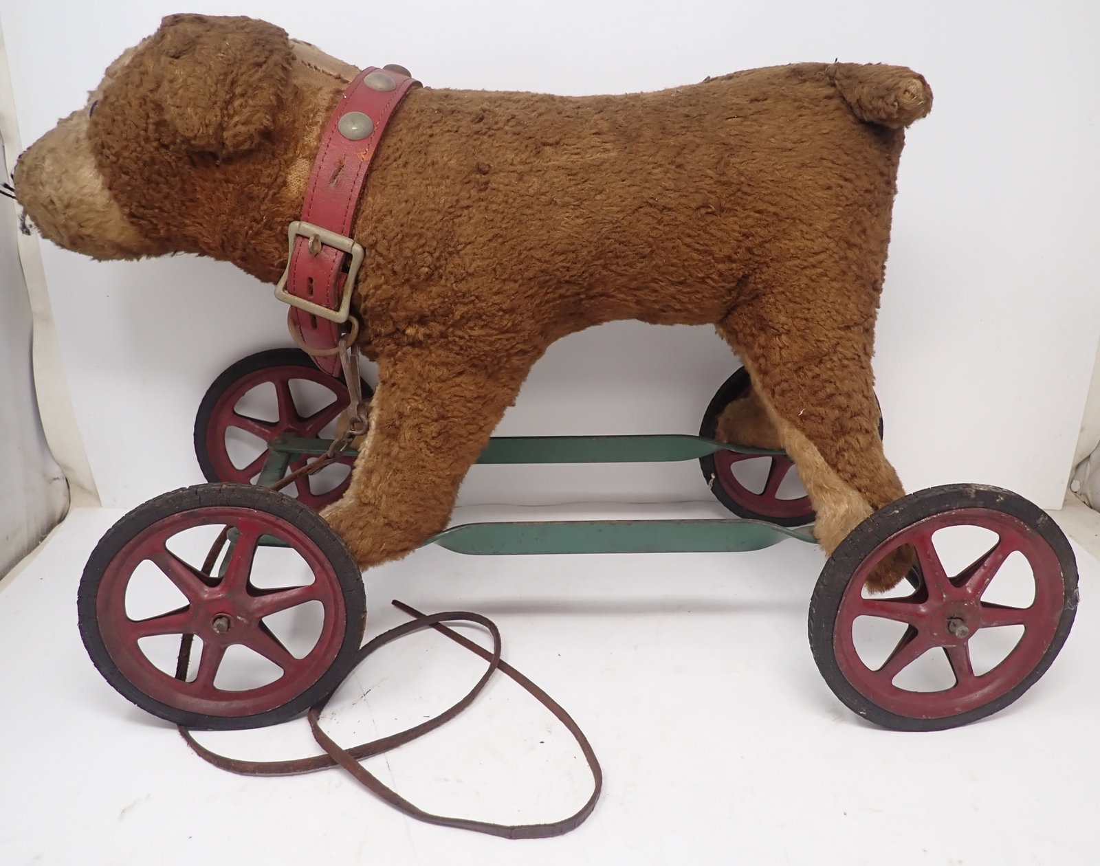 Dog Ride On Pull Toy: Approx 9" x 18 3/4" x 13 1/4" tall. Shipping available ($20 handling charge, plus postage)