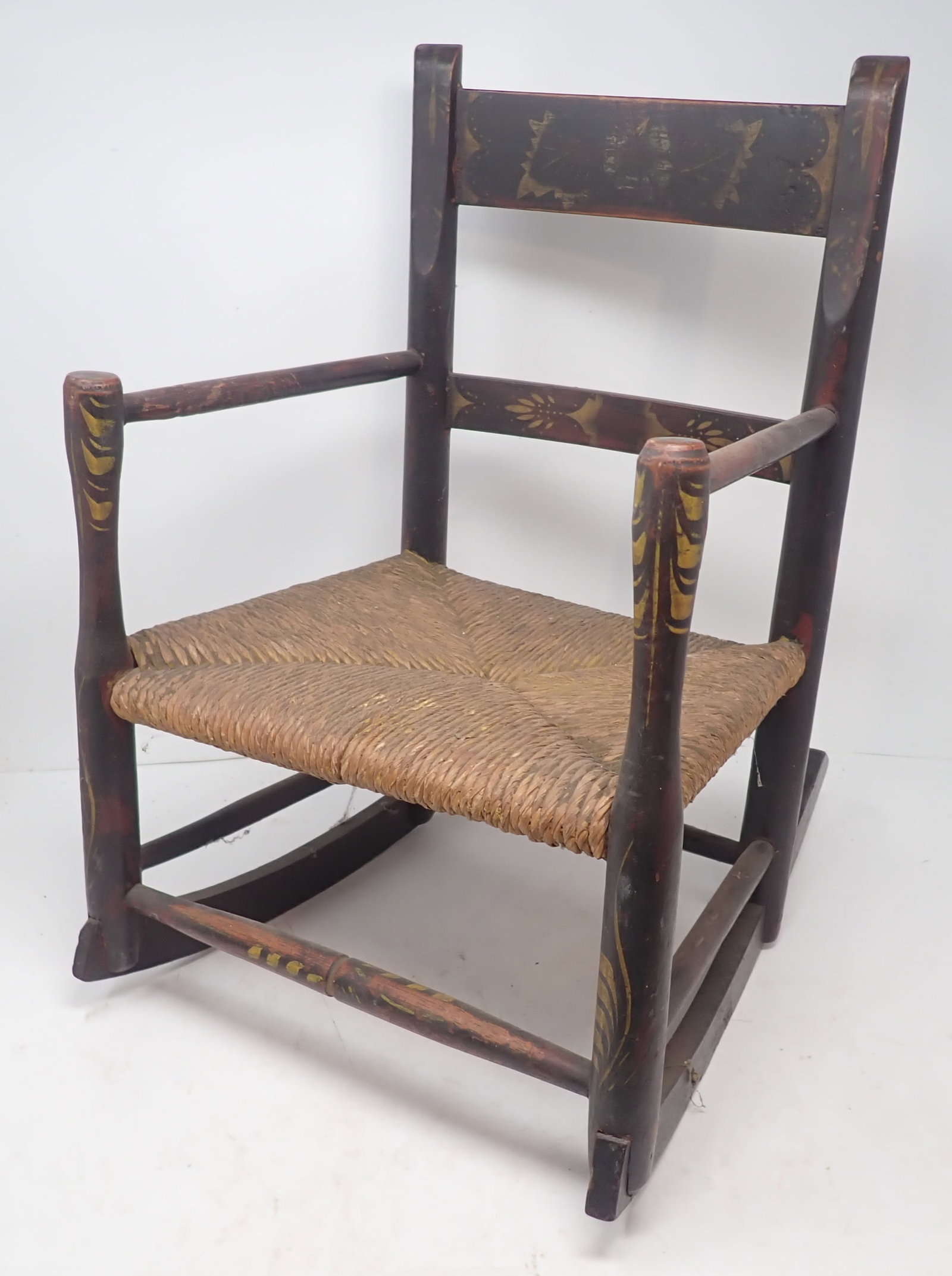Childs Paint Decorated Rocker: Approx 12 1/8" wide, 9 3/4" deep, 7 1/2" to seat and 18 1/8" tall. Shipping available ($20 handling charge, plus postage)