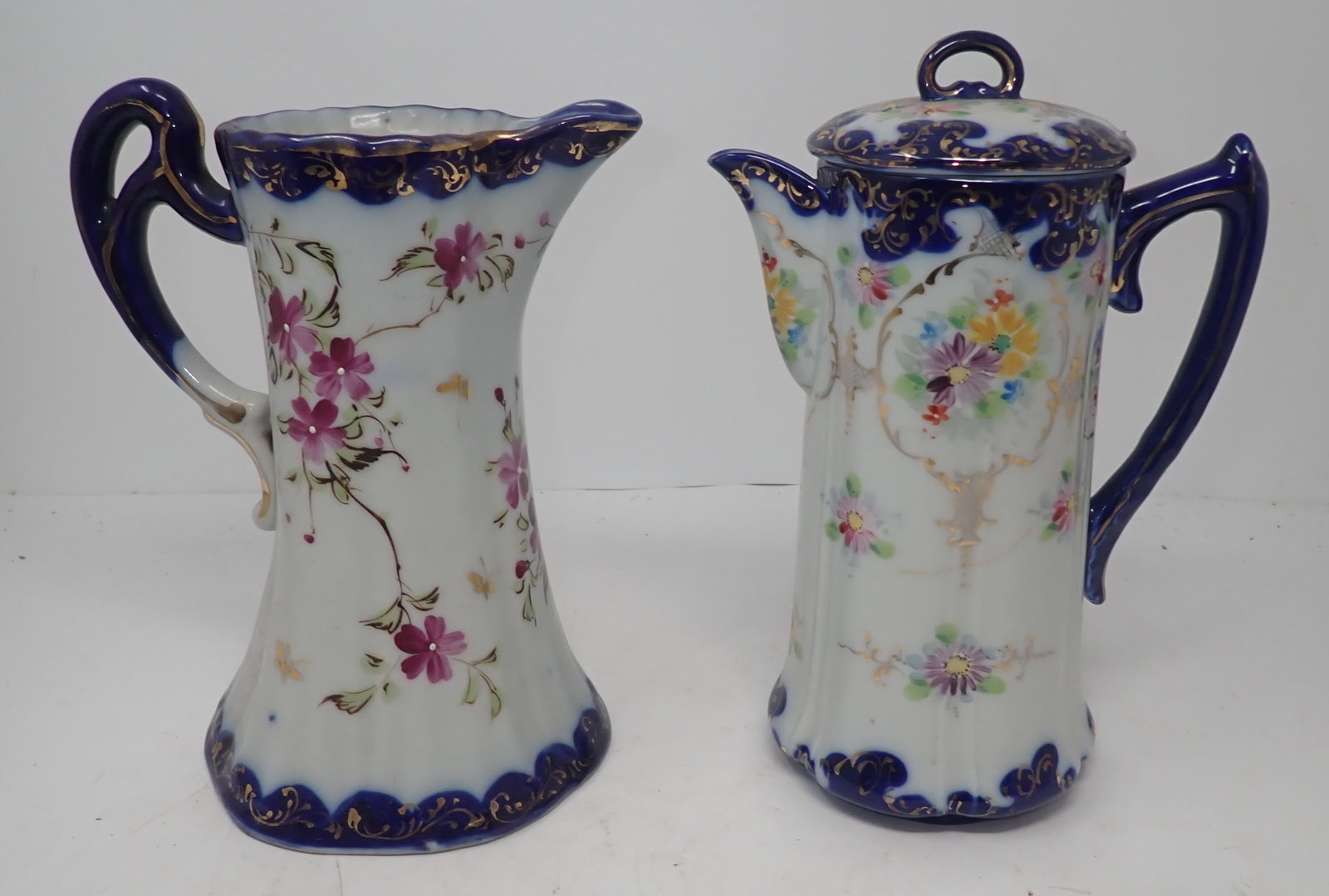 2 Chocolate Pots 1 As is: Left one is approx 8 1/8" tall. No in house shipping !