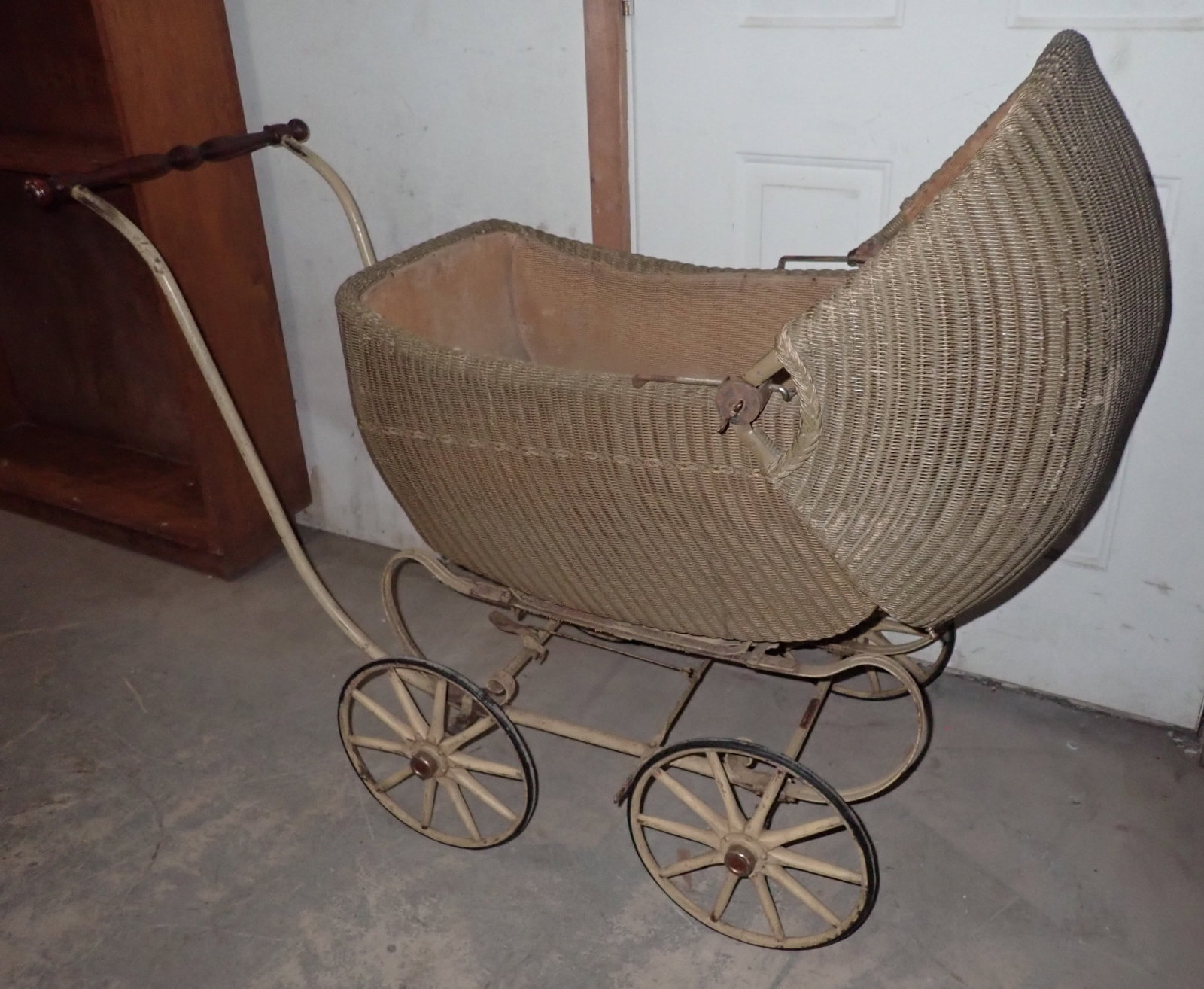 Wicker Stroller: Apprx 23 1/2" wide and 49" long. No in house shipping !