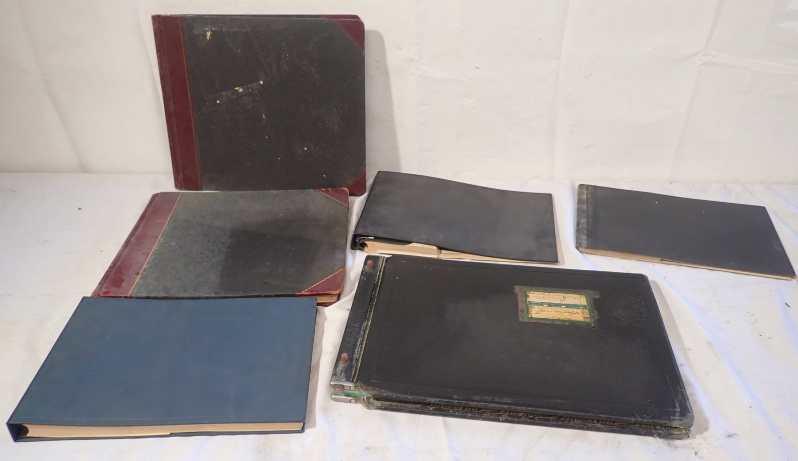 Check & Ledger Books incl Hylan Oil & Texas Co.: Largest is apprx 12" x 17 3/4". Shipping available