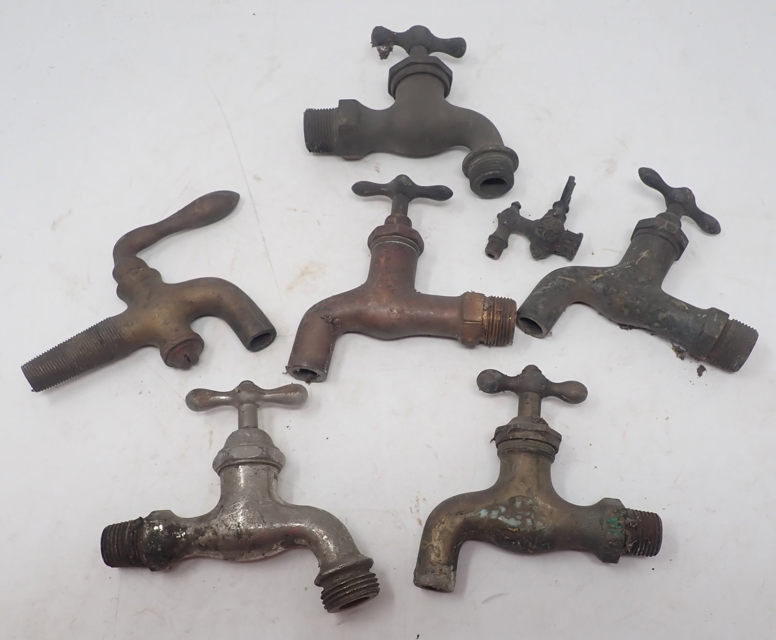 Brass & Copper Spigots: Copper one is in the middle and approx 4 5/8" long. Shipping available