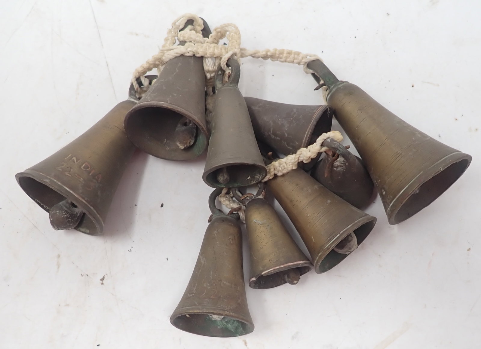 India Brass Bells: Largest is approx 2" in diameter and 4 1/4" tall. Shipping available
