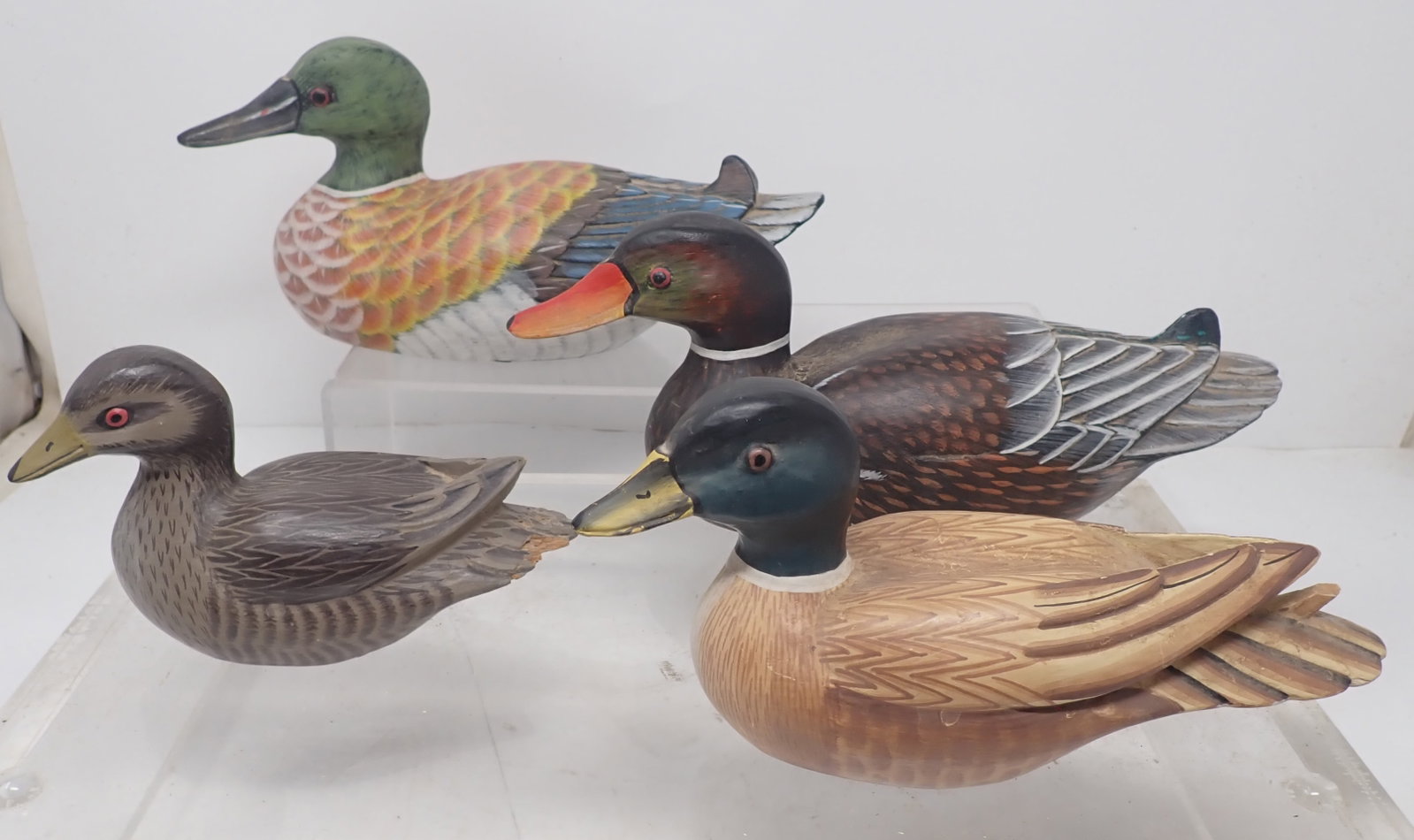 4 Duck Decoys: Largest is apprx 10" long. Shipping available
