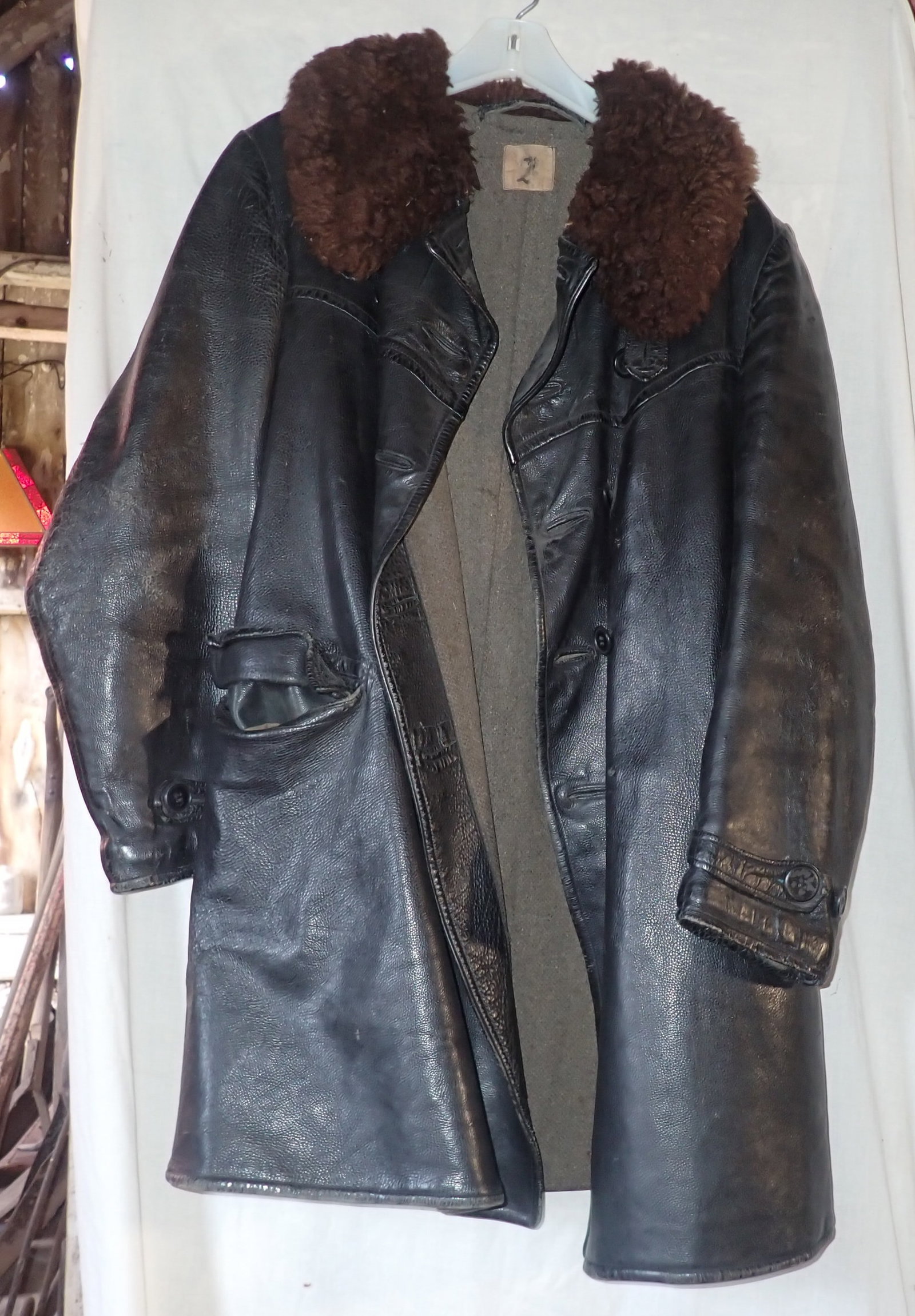 Old Leather Bomber Jacket: Approx 17" pit to pit and 38" long. Shipping available