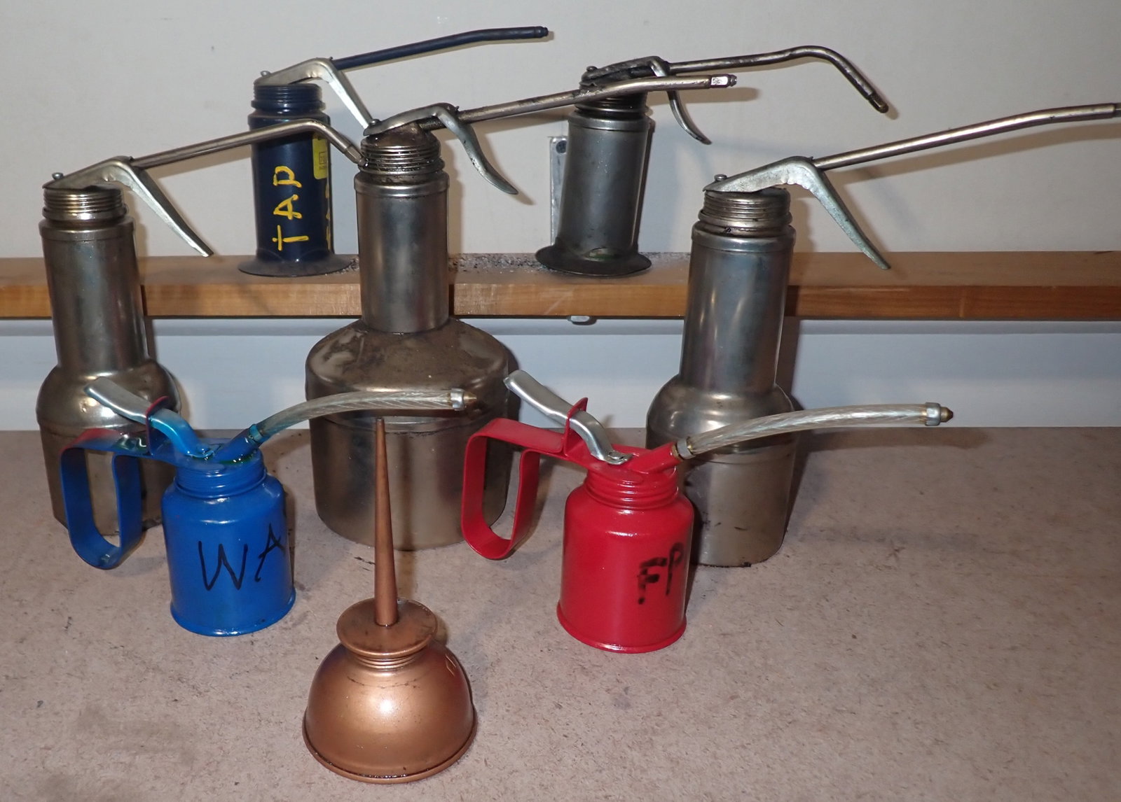 Oil Cans: Tallest is apprx 9 1/2". No in house shipping !