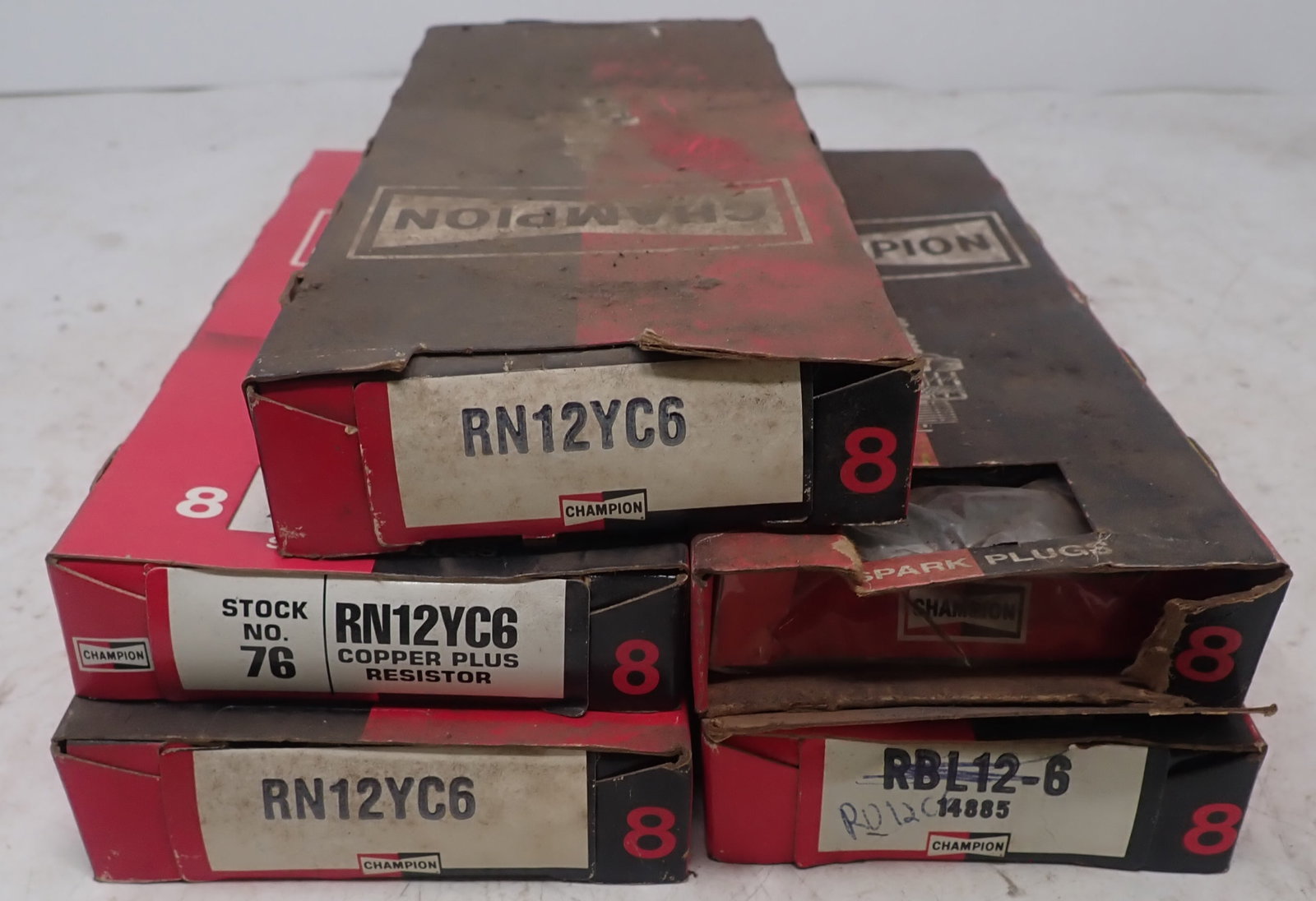 Champion Spark Plugs RBL12-6 & RN12YC6: There are (16) RBL12-6 and (24)RN12YC6 . Shipping available