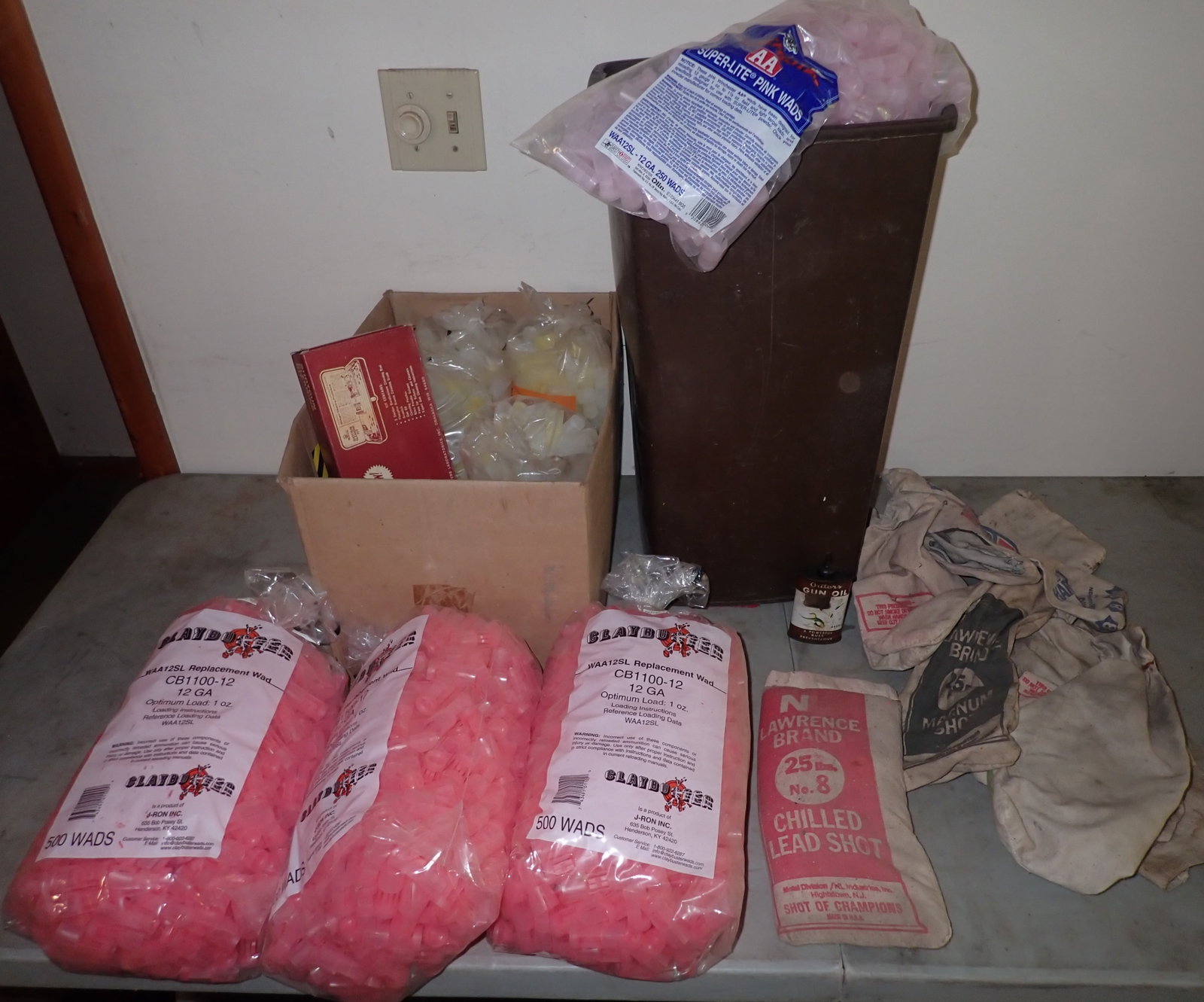 Wads , 25lbs of Lead Shot, Empty Bags, Misc Reloading: One full bag of lead shot. Other bags are empty. No in house shipping !