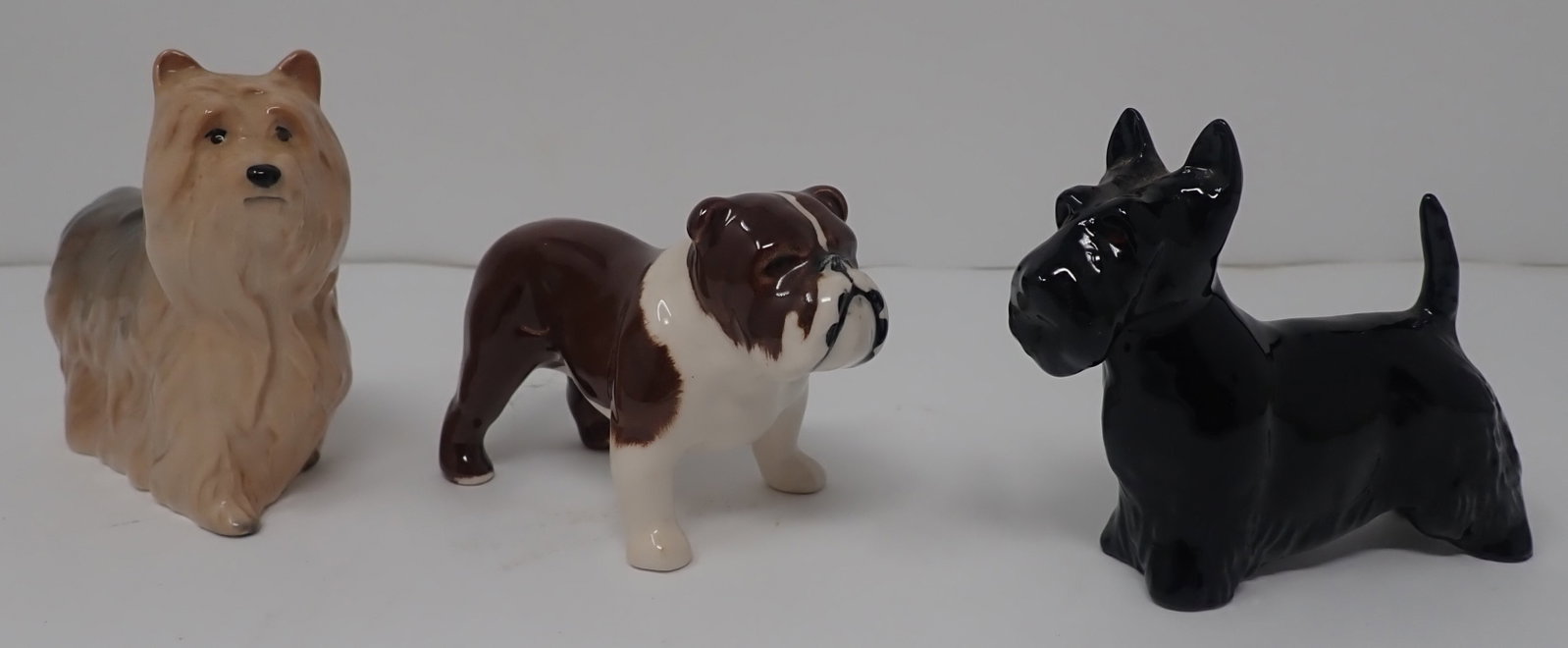 3 Beswick Dogs: Tallest is approx 3" tall. Shipping available