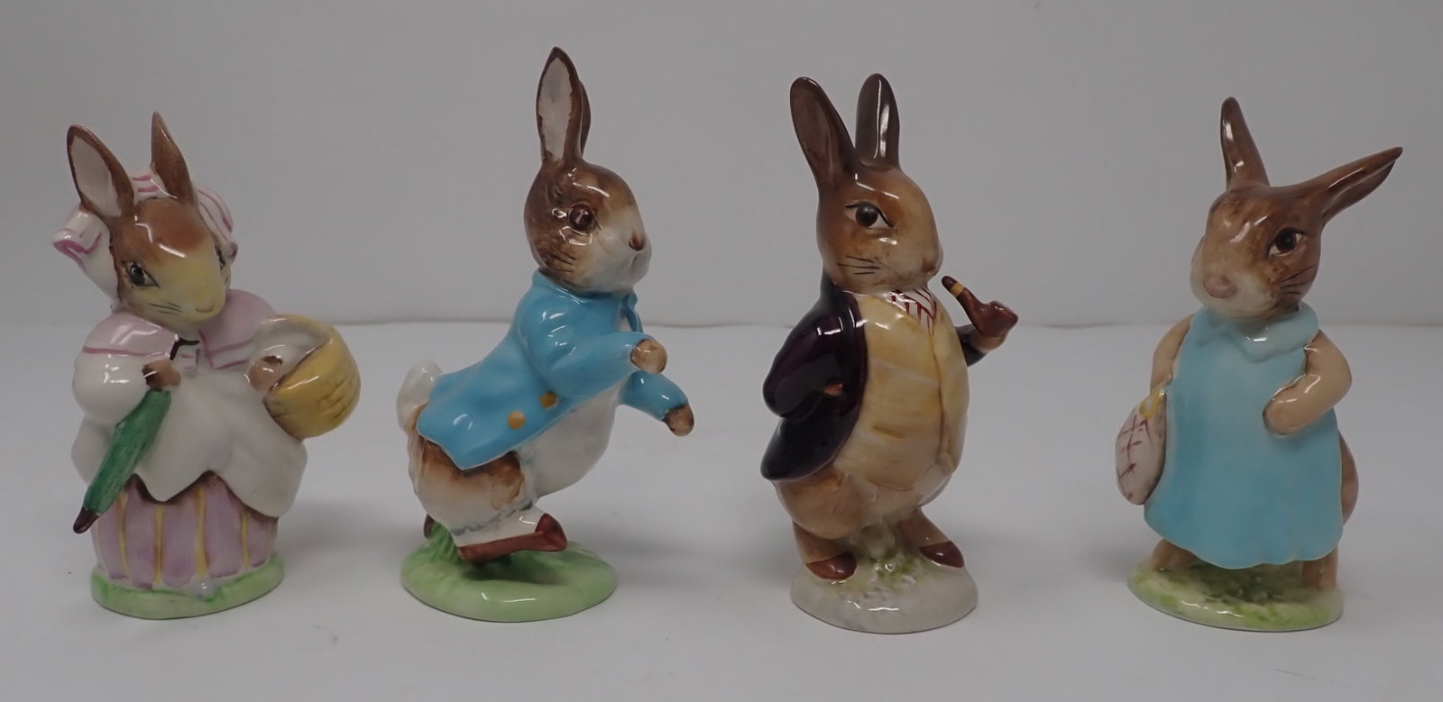 Beswick Beatrix Potters Rabbits: Tallest is apprx 4 3/8" tall. Shipping available