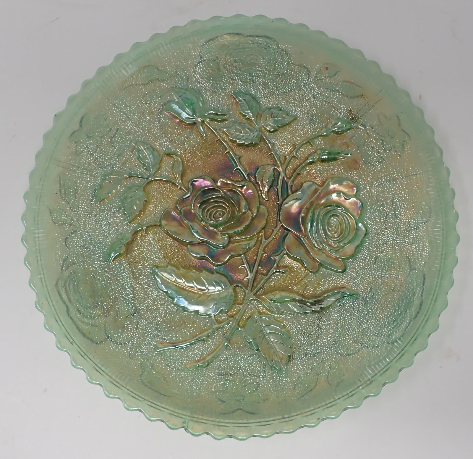 Carnival Glass Rose Patter Plate: Approx 9" in diameter . Shipping available