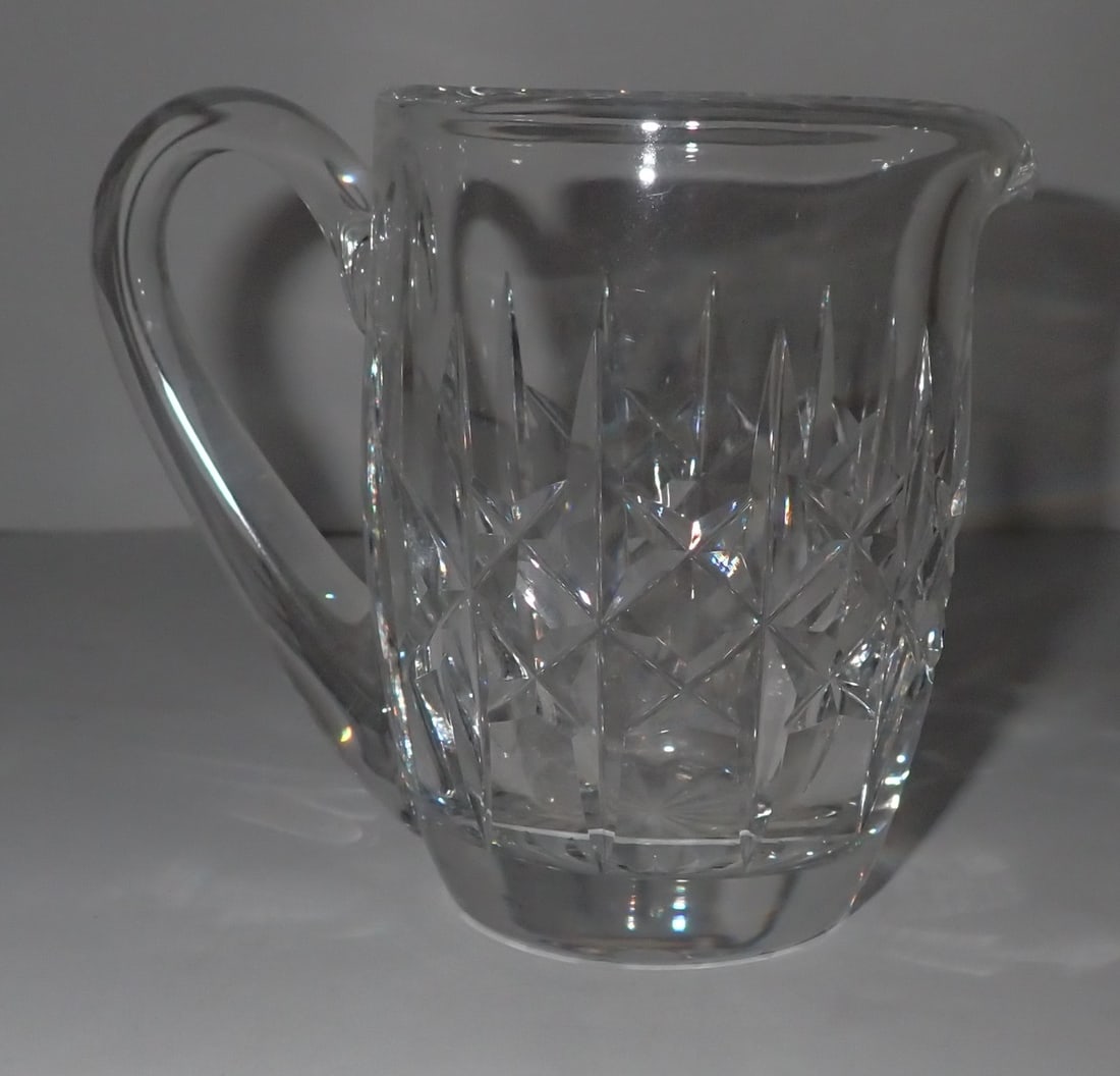 Waterford Crystal Vase: Apprx 3 7/8" tall. Marked Waterford on bottom. Shipping available