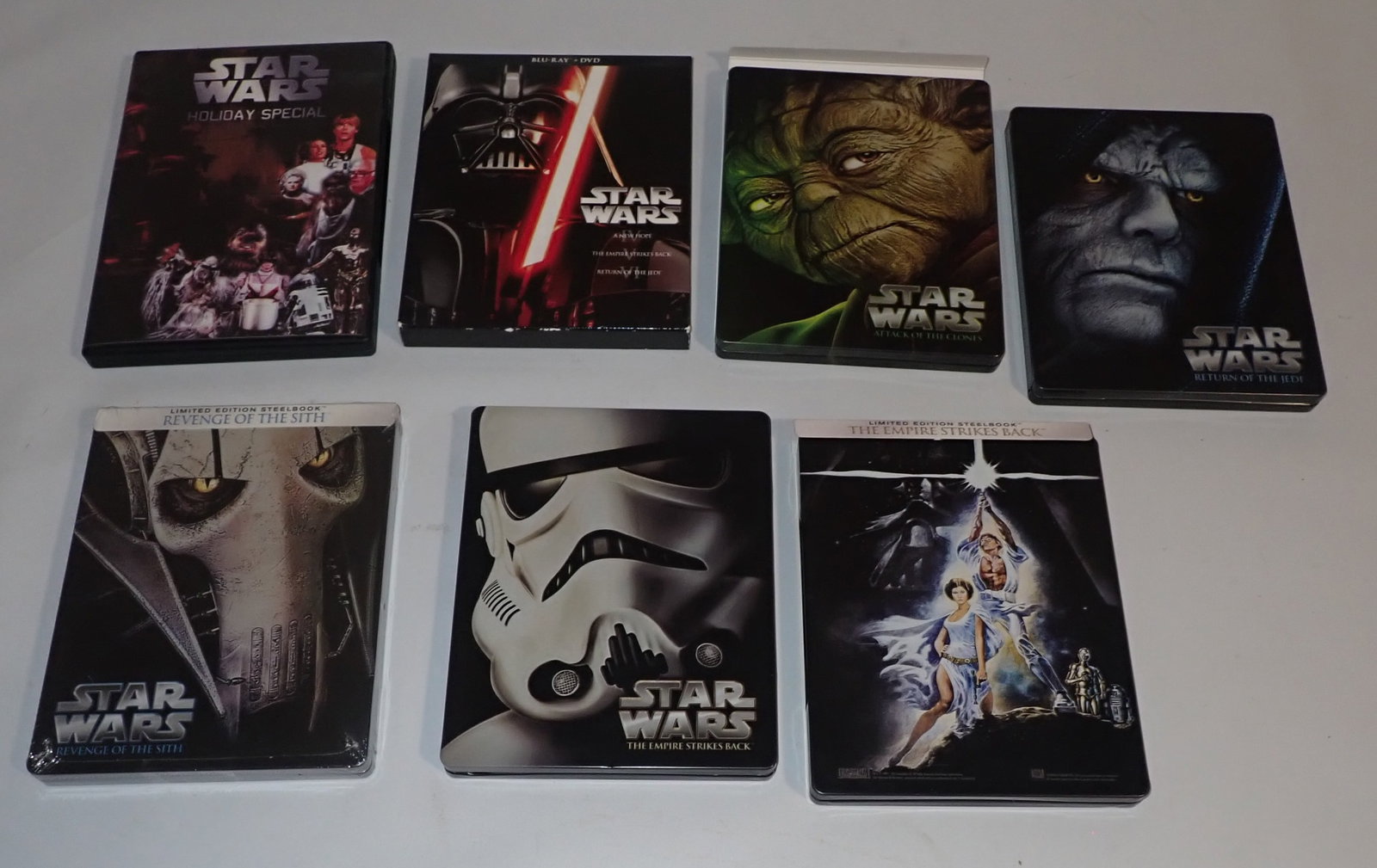 Star Wars Dvd's: We do not guarantee cases have correct discs in them. Front left one is sealed. Shipping available