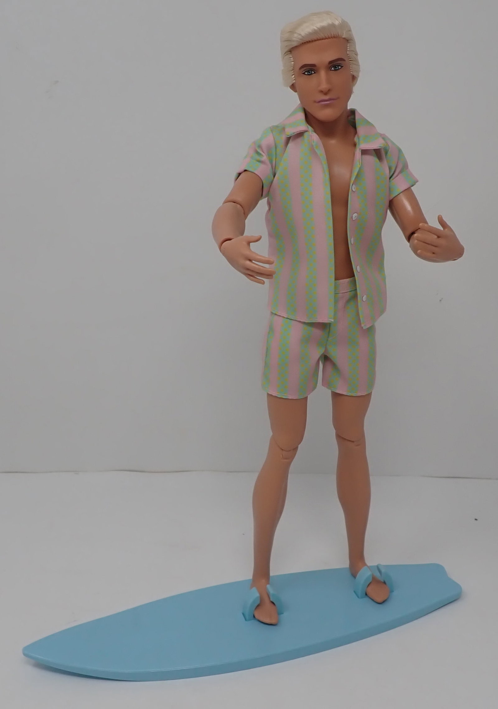 2022 Mattel Ken Doll on Surf board: Apprx 12 1/4" tall. Shipping available