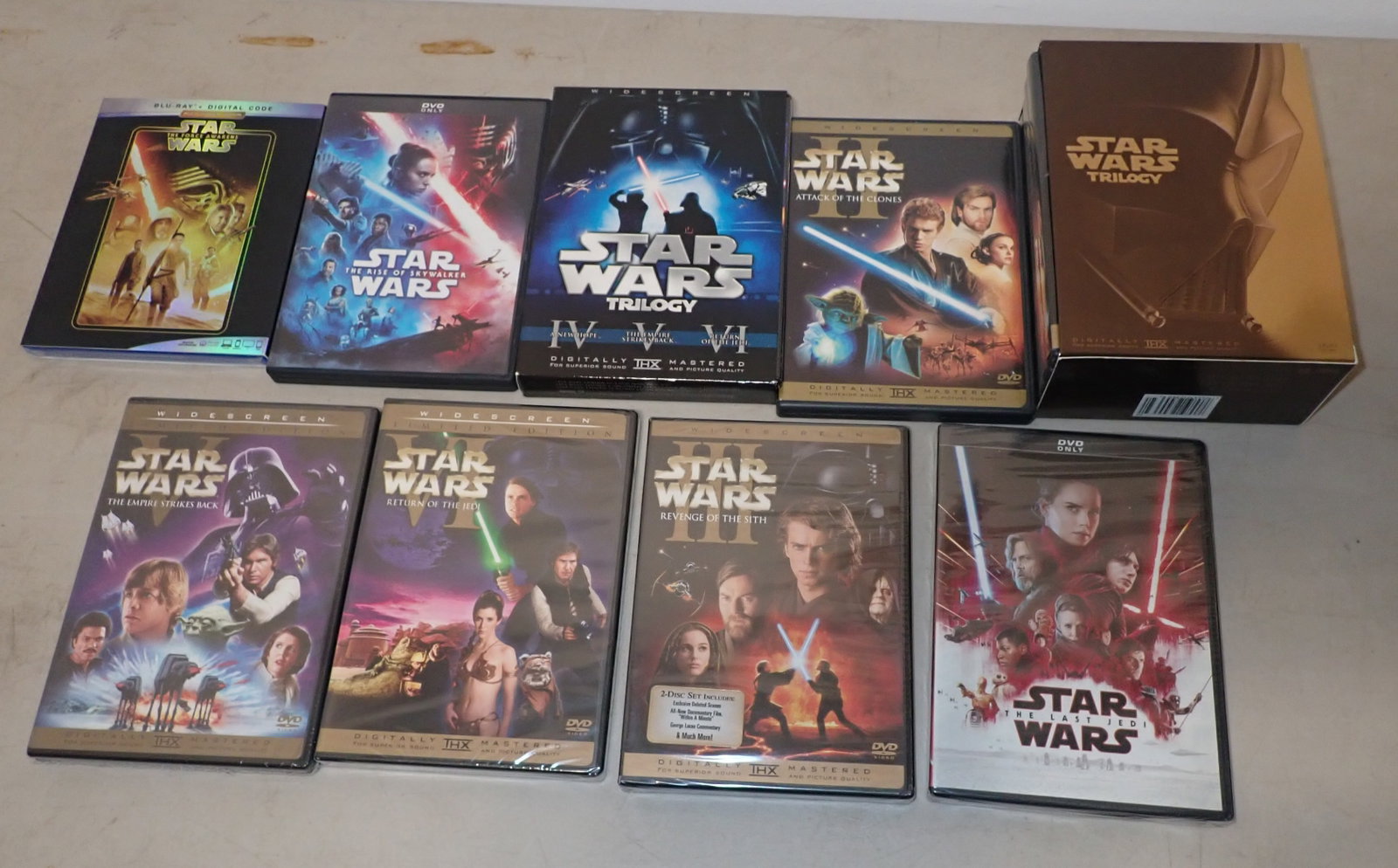 Star Wars Dvd's: We do not guarantee cases have correct discs in them. Front row are all sealed. Shipping available