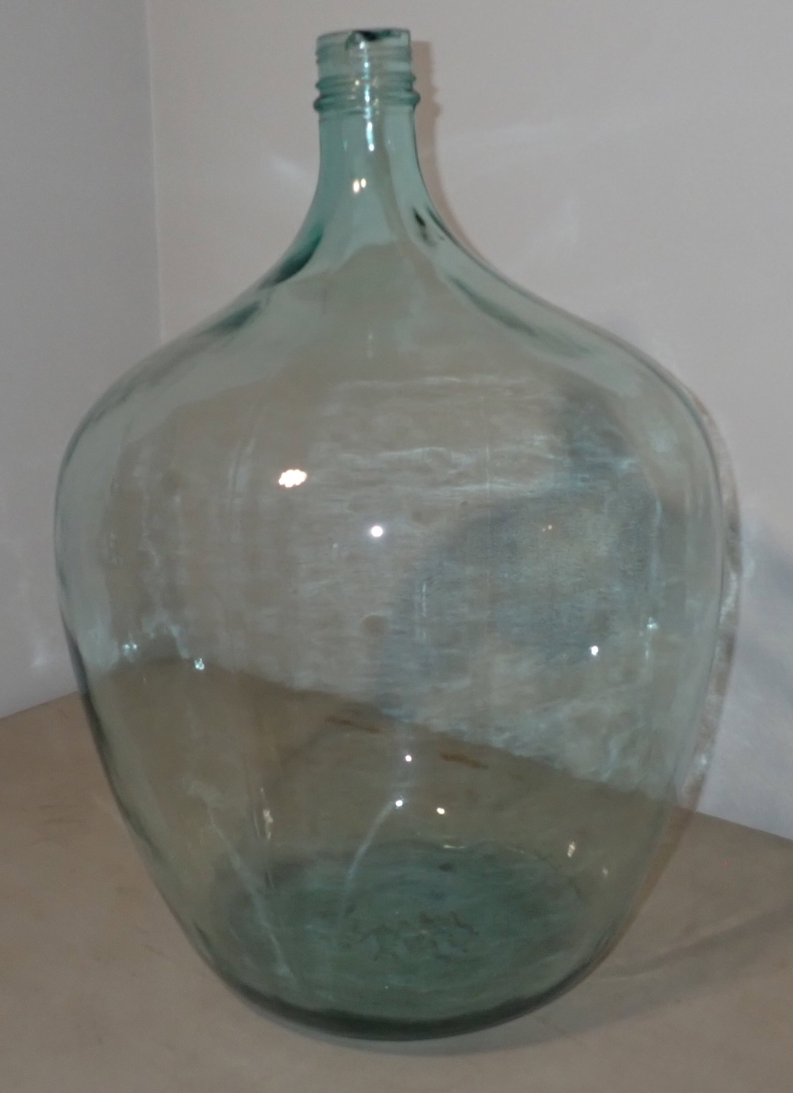 Demijohn Bottle: Approx 13" in diameter and 20" tall. No in house shipping !