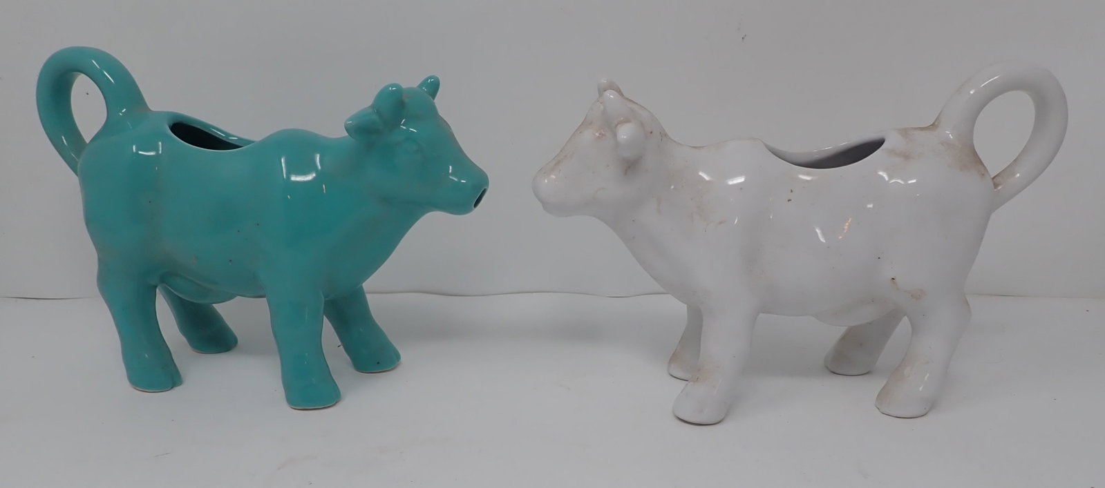 2 Food Network Cow Creamers: Approx 8" long and 5 1/4" tall. Shipping available.