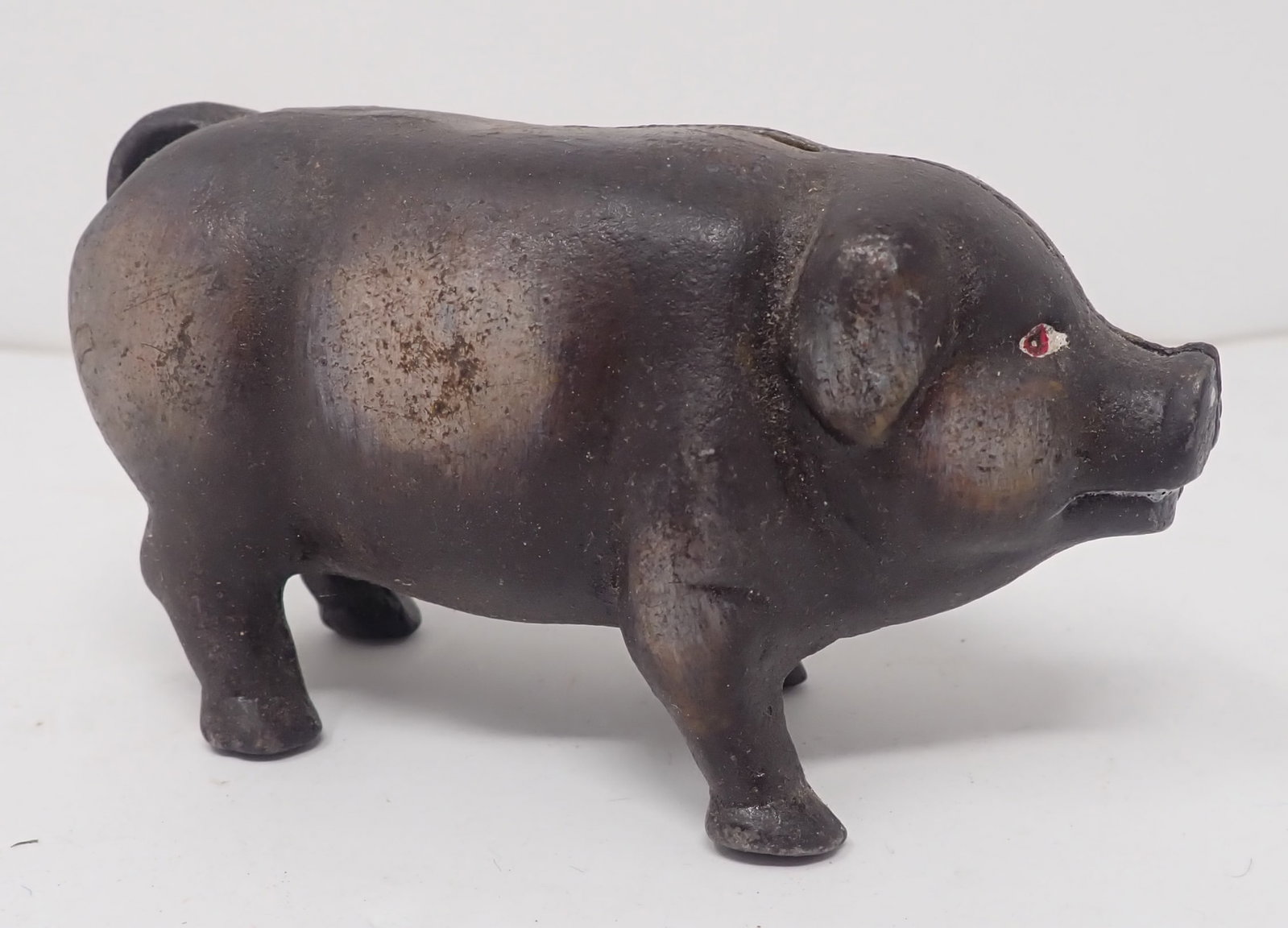 Cast Iron Pig Still Bank: Approx 4 1/4" long and 2 1/2" tall. Shipping available