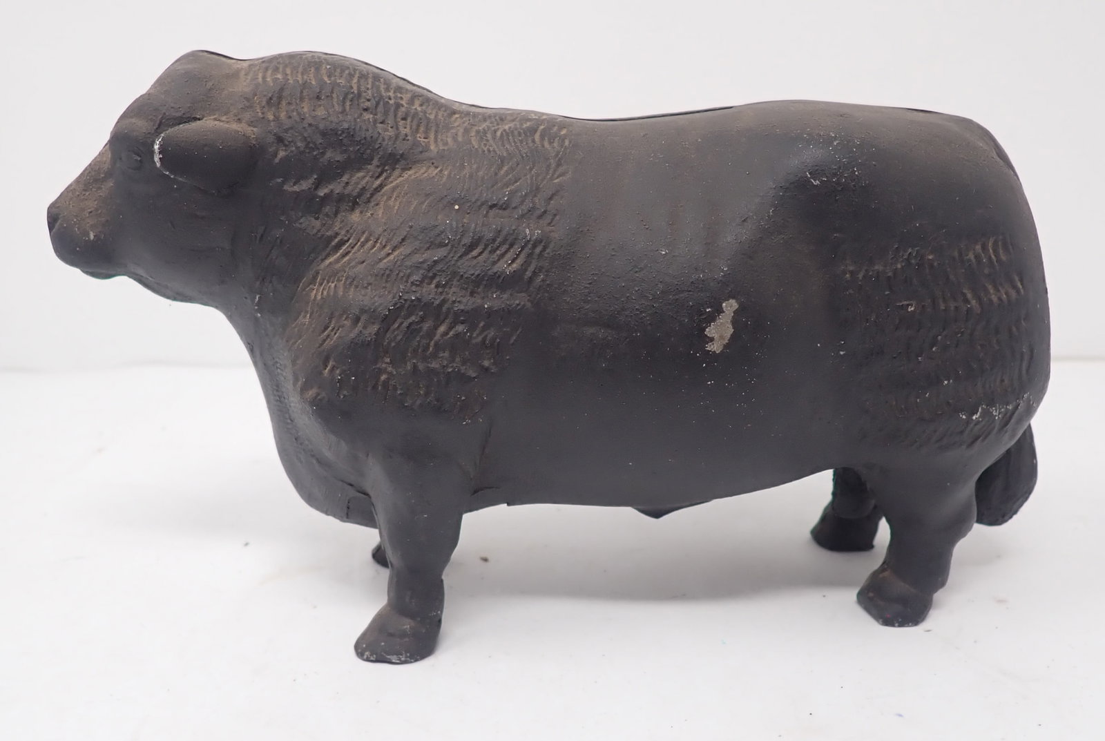 Cast Aluminum Bull Still Bank: Approx 7 1/4" long and 4 3/8" tall. Shipping available