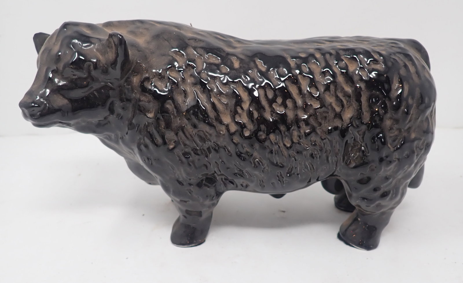 Porcelain Bull: Approx 8 7/8" long and 5 1/4" tall. Shipping available