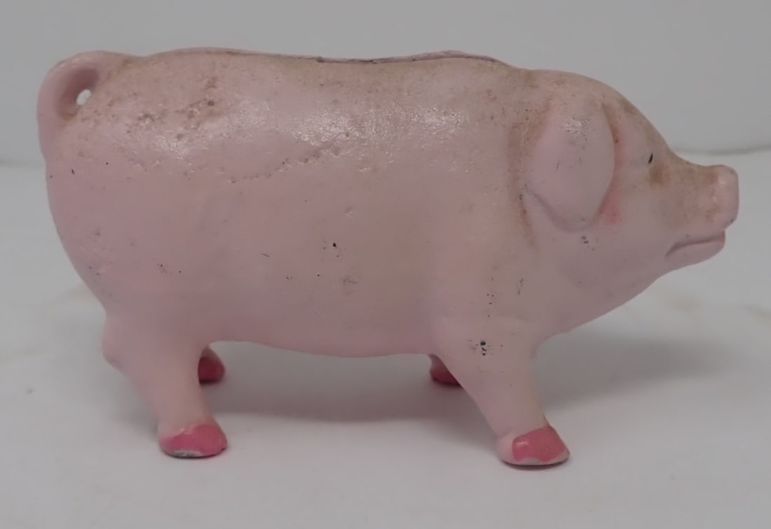 Cast Iron Pig Still Bank: Approx 4 3/8" long and 2 1/2" tall. Shipping available