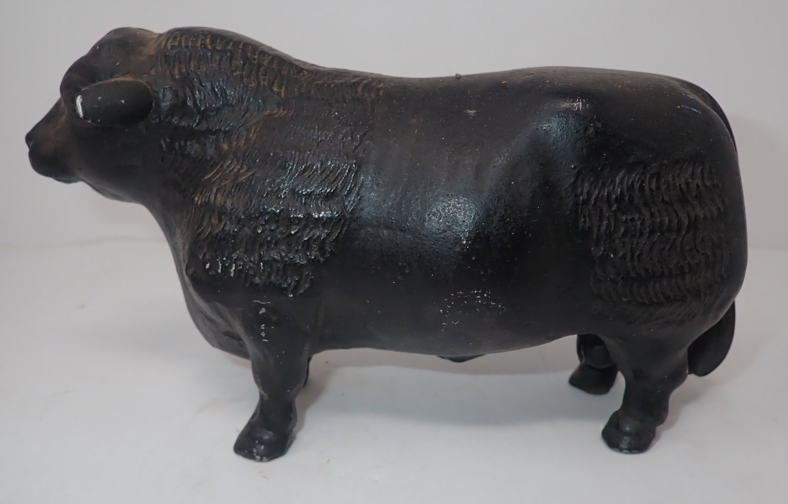 Cast Aluminum Bull Still Bank: Apprx 7" long and 4 3/8" tall. Shipping available