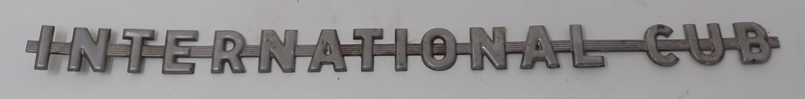 International Cub Tractor Side Emblem: Approx 1"x 16". Shipping available