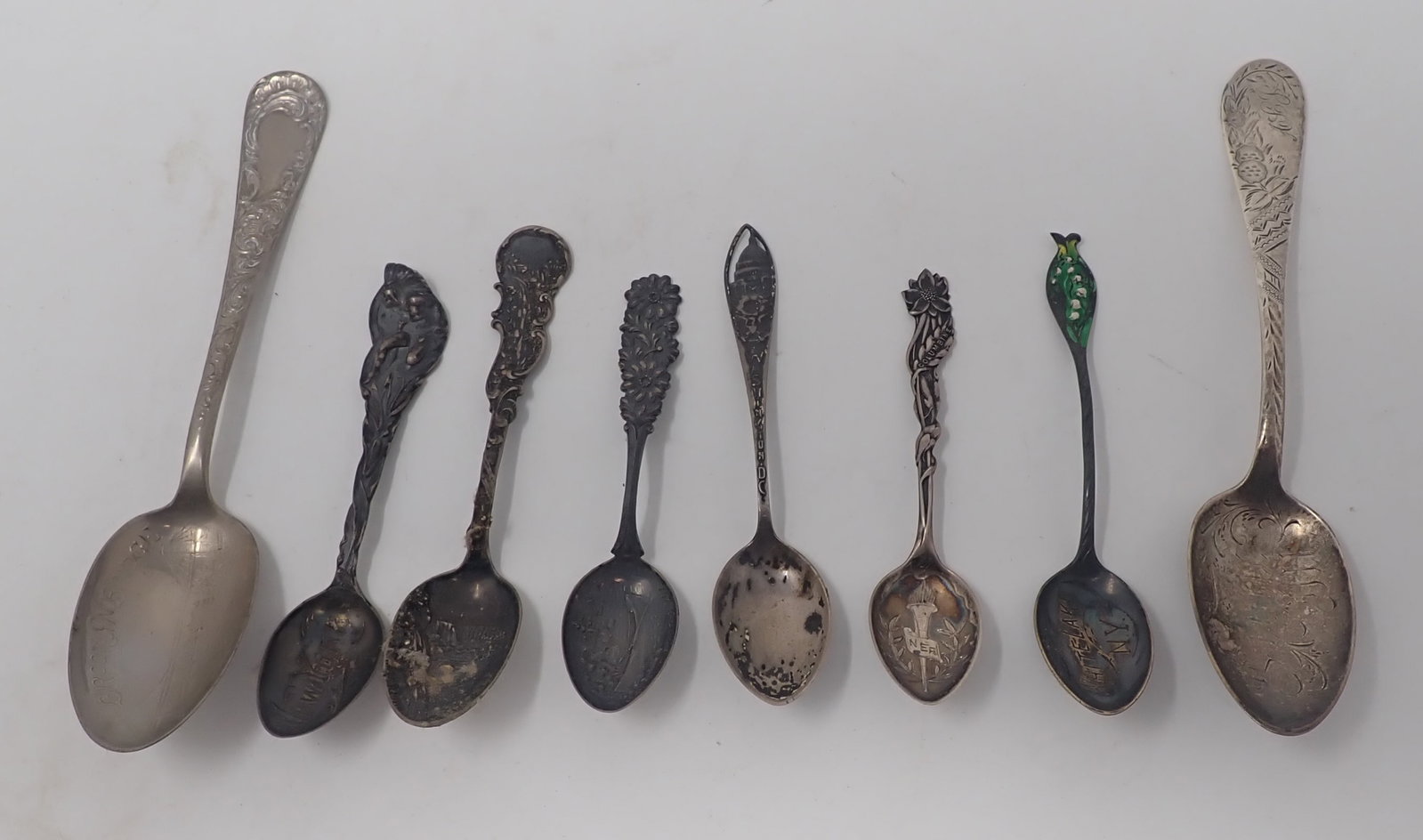 Sterling Silver Souvenir Spoons incl Brooklyn Bridge: Longest are apprx 5 3/4". Total weight is apprx 90 grams. All marked sterling. Shipping available