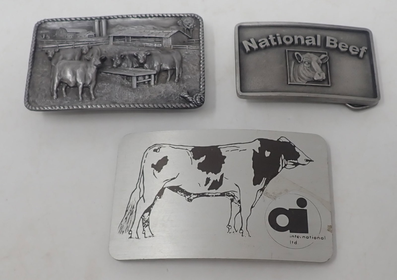 Pewter & Aluminum Cow Belt Buckles: Largest is apprx 2 1/2" x 4". Shipping available