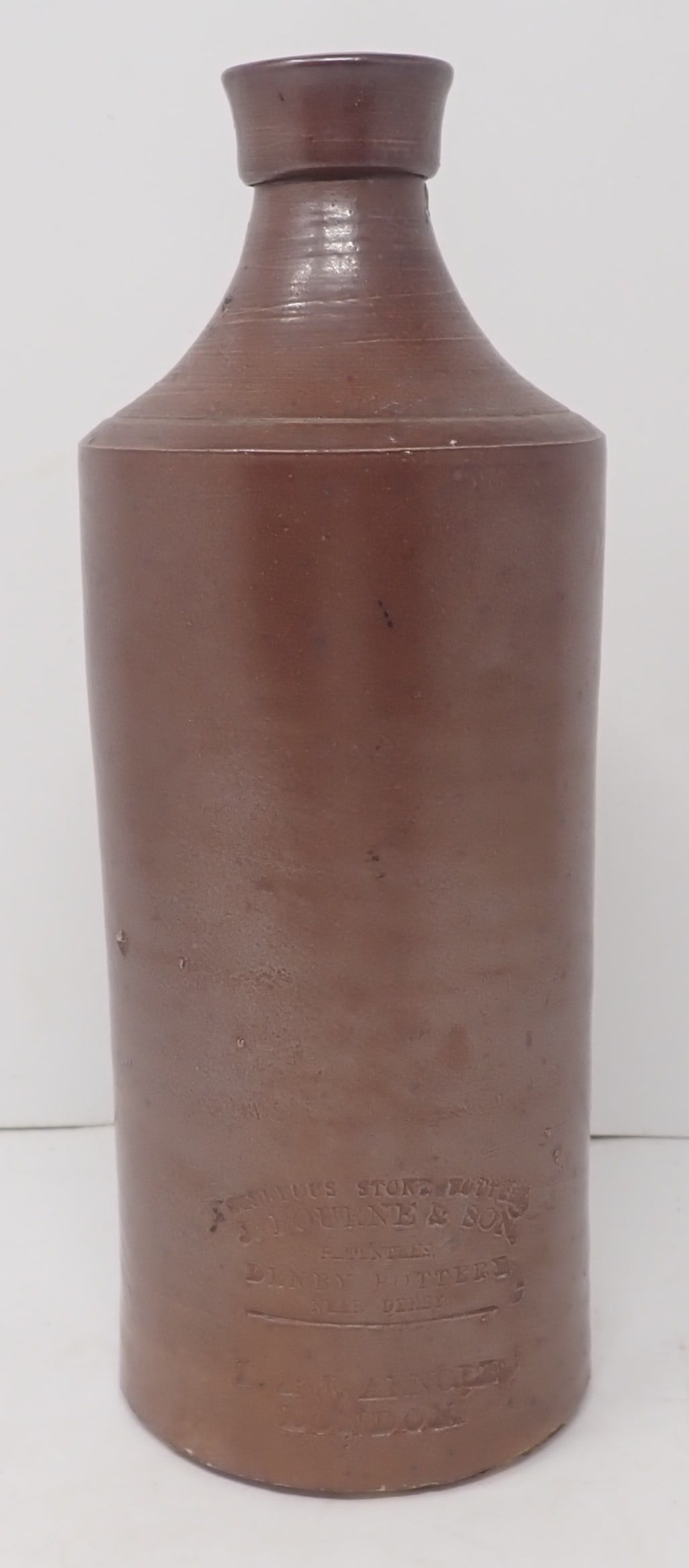 J. Bourne Denby Pottery London Bottle: Approx 3 3/8" in diameter and 9 1/4" tall. Shipping available