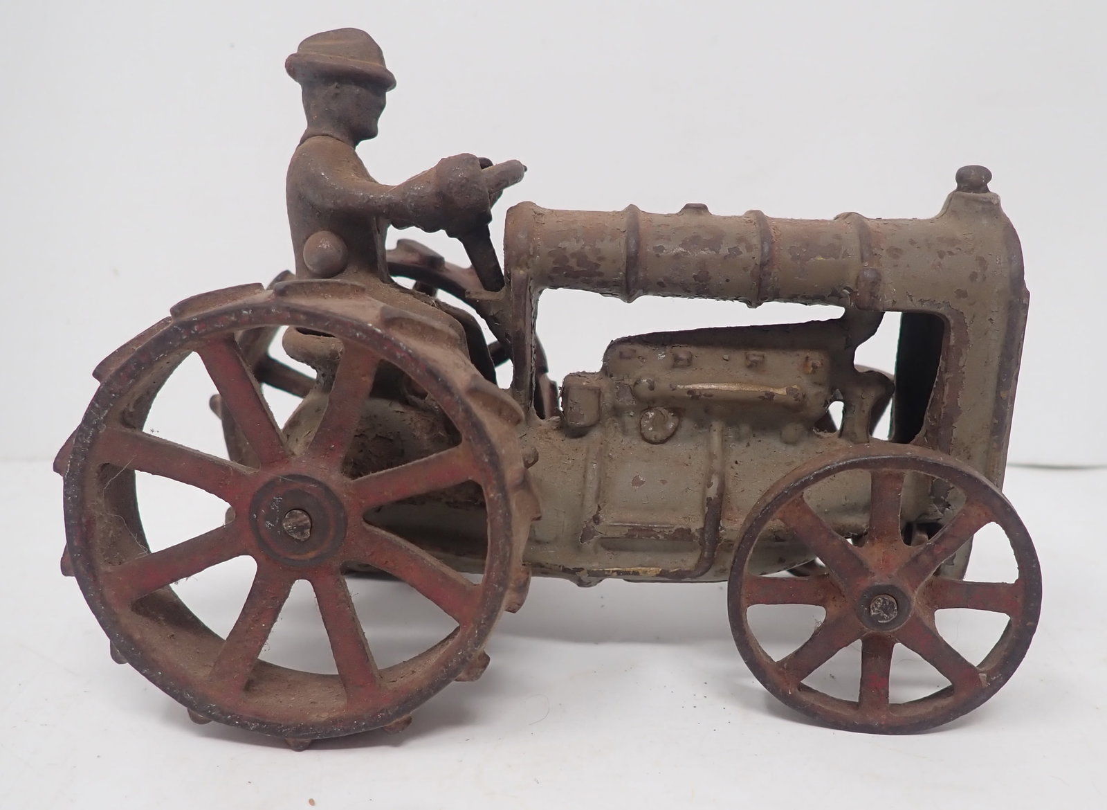 Arcade Cast Iron Fordson Tractor w/ Driver: Approx 5 7/8" long and 4 1/4" tall. Shipping available