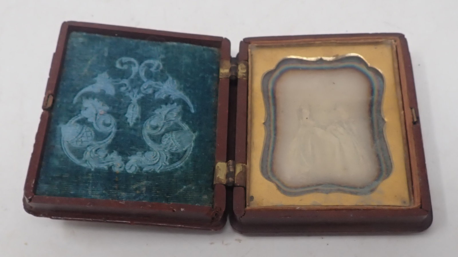 Daguerrotype Case w/ Tintype: Case is apprx 2 1/2" x 3". Shipping available