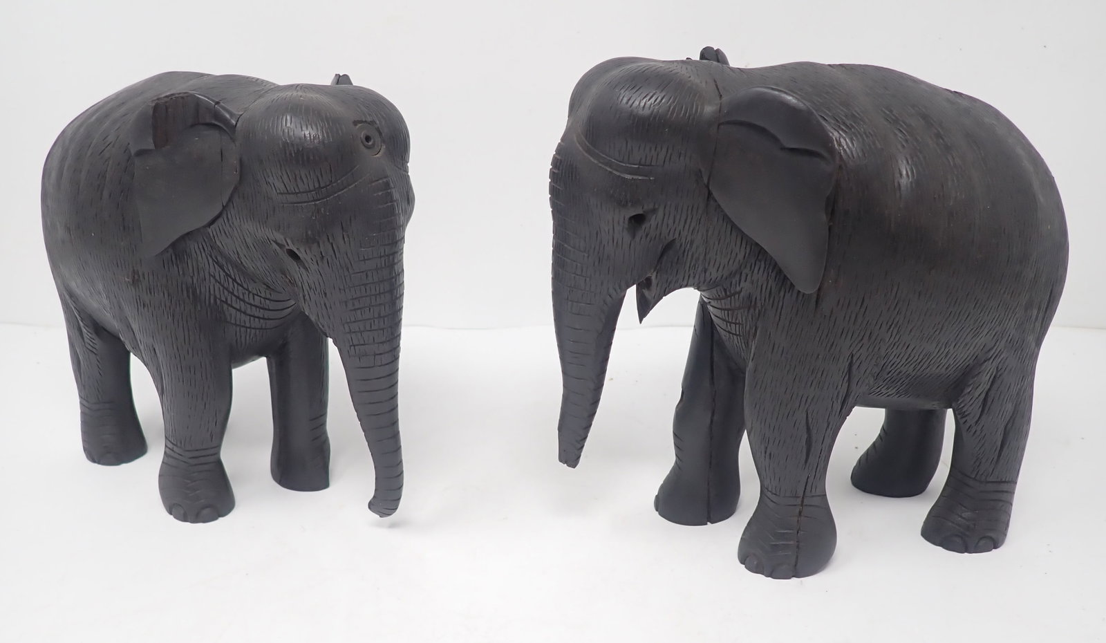 2 Ebony Elephants: Approx 6 1/2" long and 6 1/2" tall. Shipping available