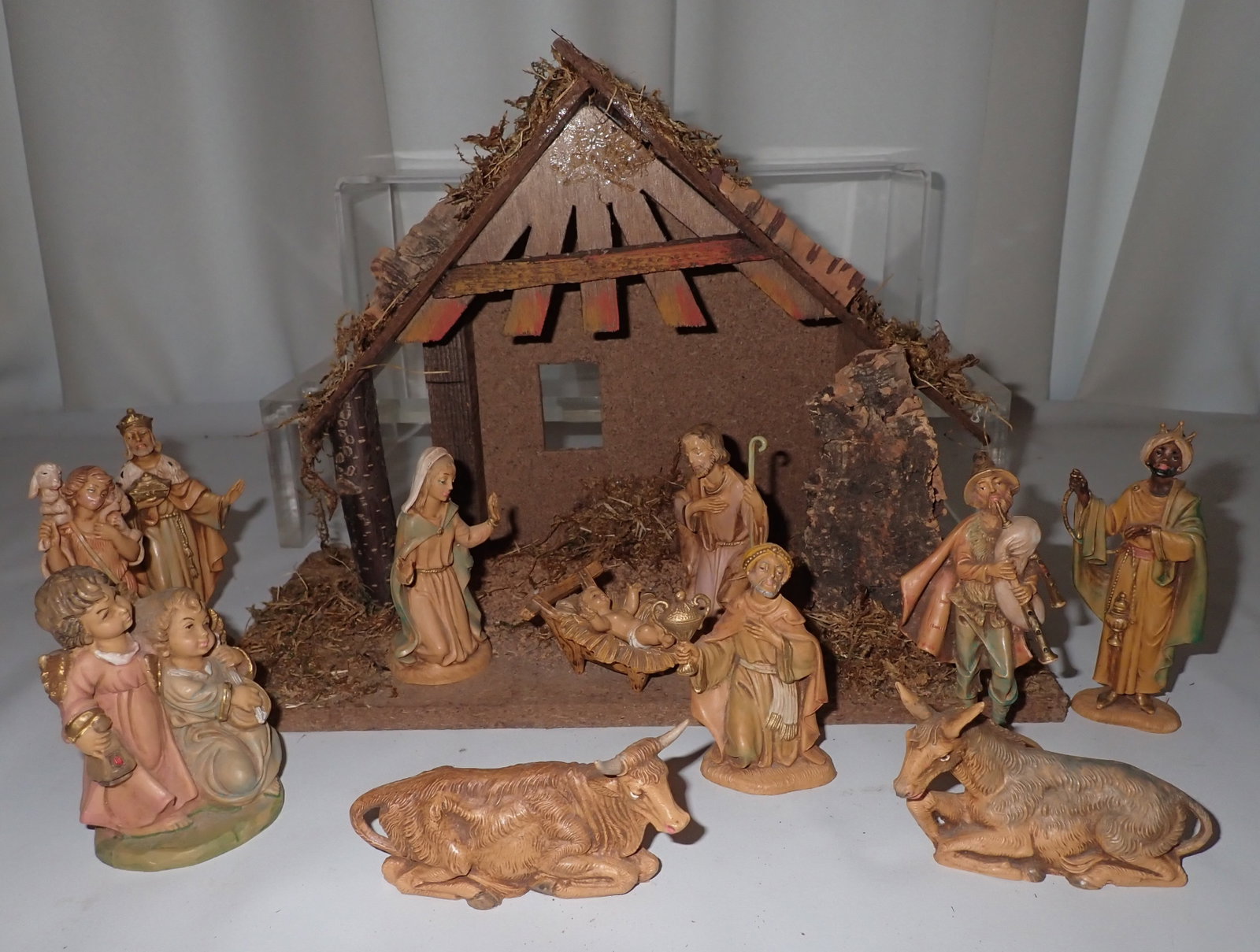 Manger and Nativity Figures: Manger is approx 6 1/4" x 12" x 9" tall. Shipping available ( $20 handling charge, plus postage)