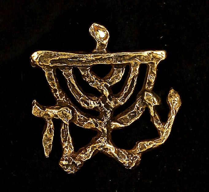 Jacques Lipchitz 1891-1973 (French) Menorah brooch gold: ** Jacques Lipchitz 1891-1973 (French) Menorah brooch gold plated brass with stone, limited edition / multiples 4.70 x 5 cm (2 x 2 in.) initialled lower right, signed on the reverse Provenance: Jewish