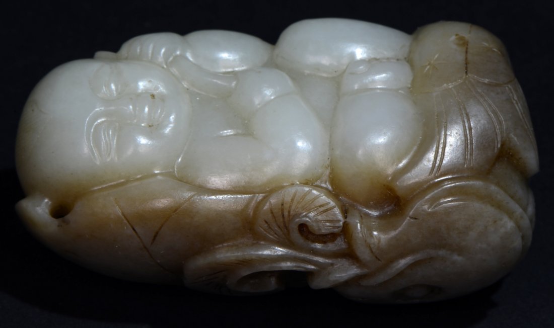 A Chinese Carved White Jade figure with Boy (1 of 4)