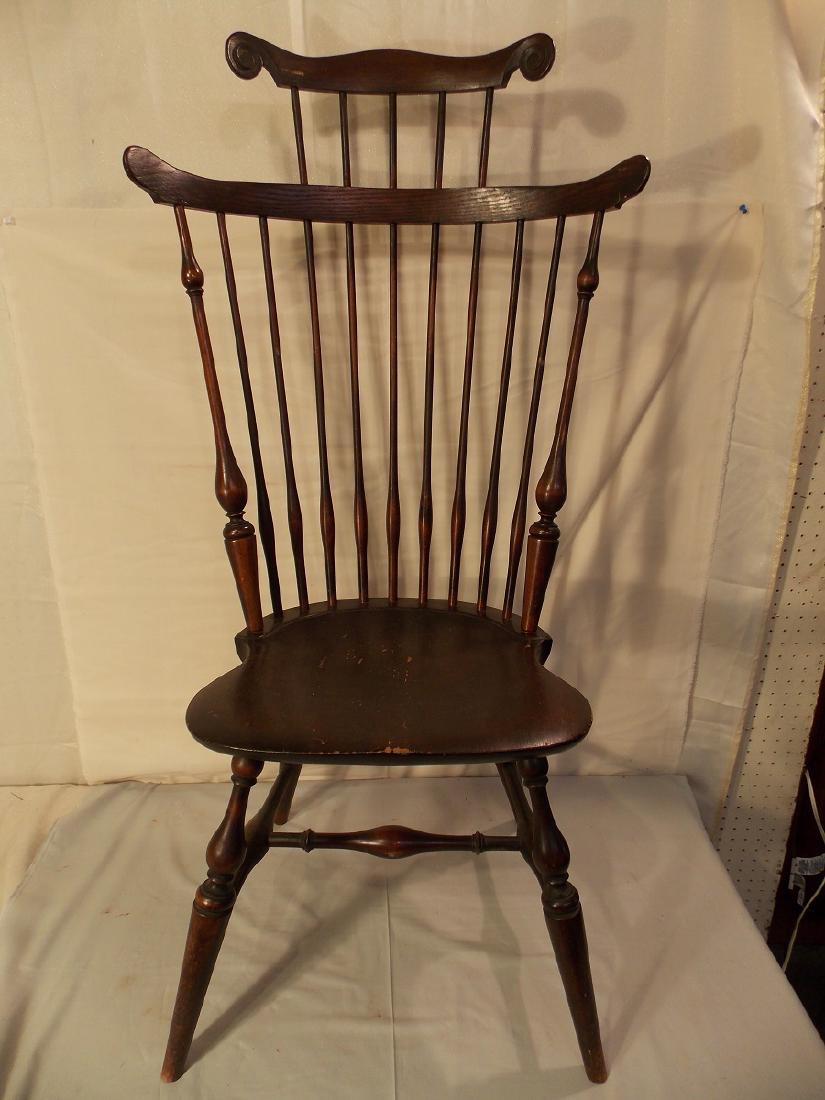 WALLACE NUTTING DOUBLE COMB BACK WINDSOR: Fine Wallace Nutting labeled double comb back Windsor chair with scrolled upper splat. Numbered 1311. 46 in tall.