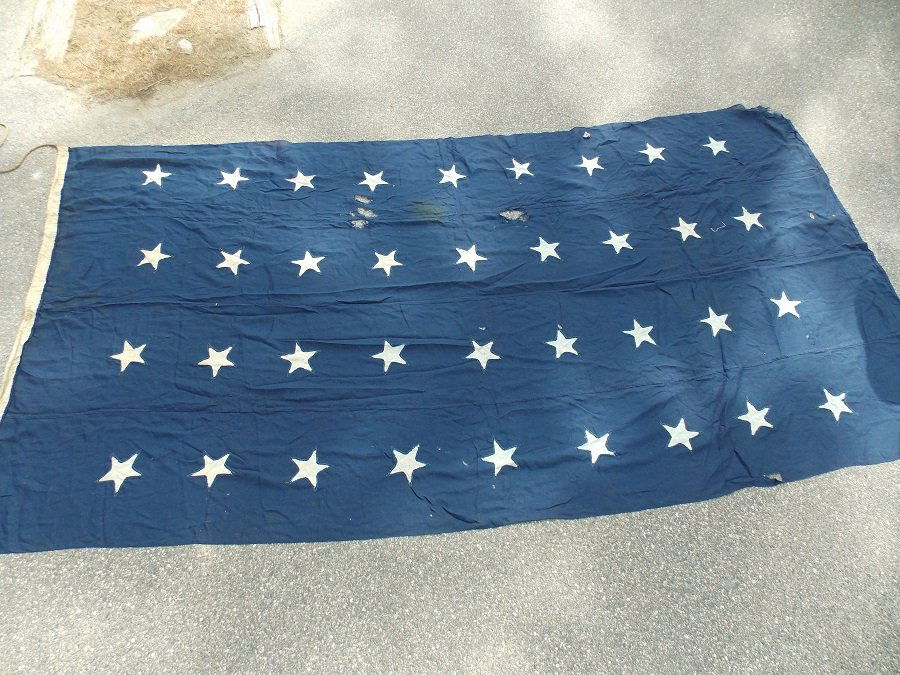 36 STAR NAVAL JACK FLAG 1865: Large Civil War era naval jack flag with 36 white stars on blue ground. Made from 1865-1867. Size: 11 ft 2 by 5 ft 7.