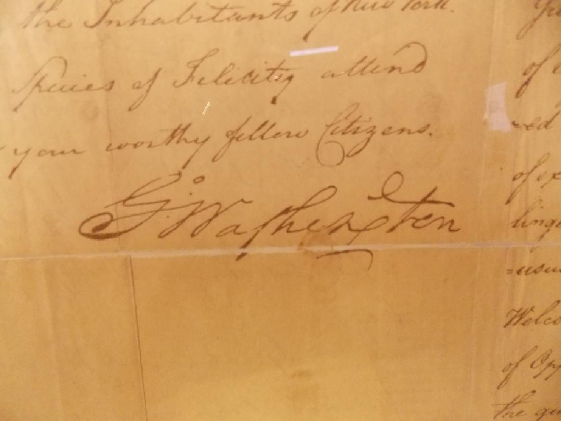 GEORGE WASHINGTON SIGNED DOCUMENT: Early paper document dated Nov. 26, 1783 to Citizens of New York returned from exile signed by George Washington. 13 x 16 inches. Loose mount between lucite panels. Has stains and damage. We are not e