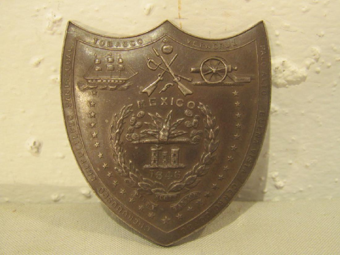 1846 MEXICAN WAR MEDAL: Silvered metal shield-form Mexican-American War badge or medal for Major Isaac J. Stevens, Adj. of Engineers, dated 1846 Mexico. 2.25 x 2 inches.