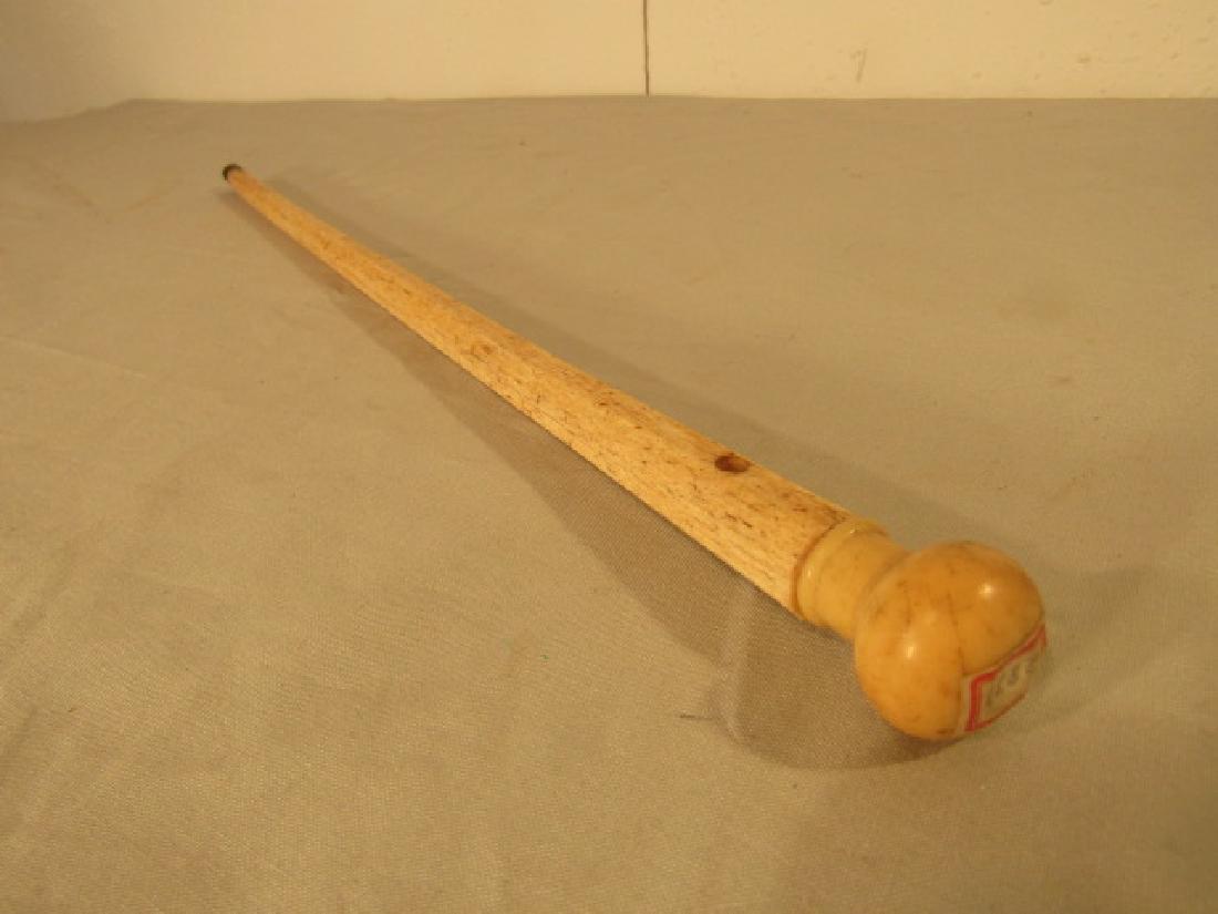 CHILD'S WHALEBONE CANE: Rare antique child's carved whale bone cane with ball top and hexagonal shaft. 18 in long.
