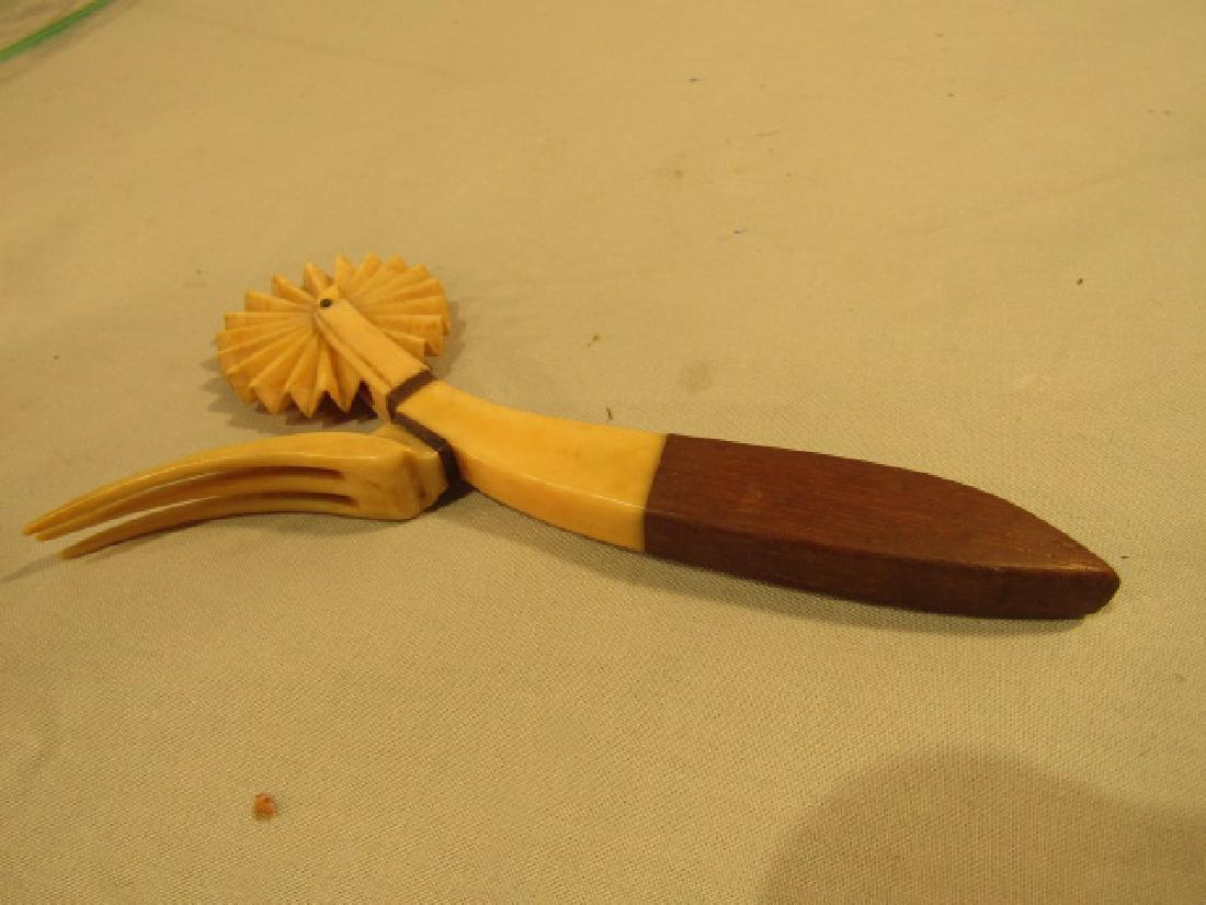 ANTIQUE WHALE BONE & WOOD CRIMPER: 19th century whale bone and wood crimper with 3 tine fork on one end. 7 x 3.75 inches. VG condition.