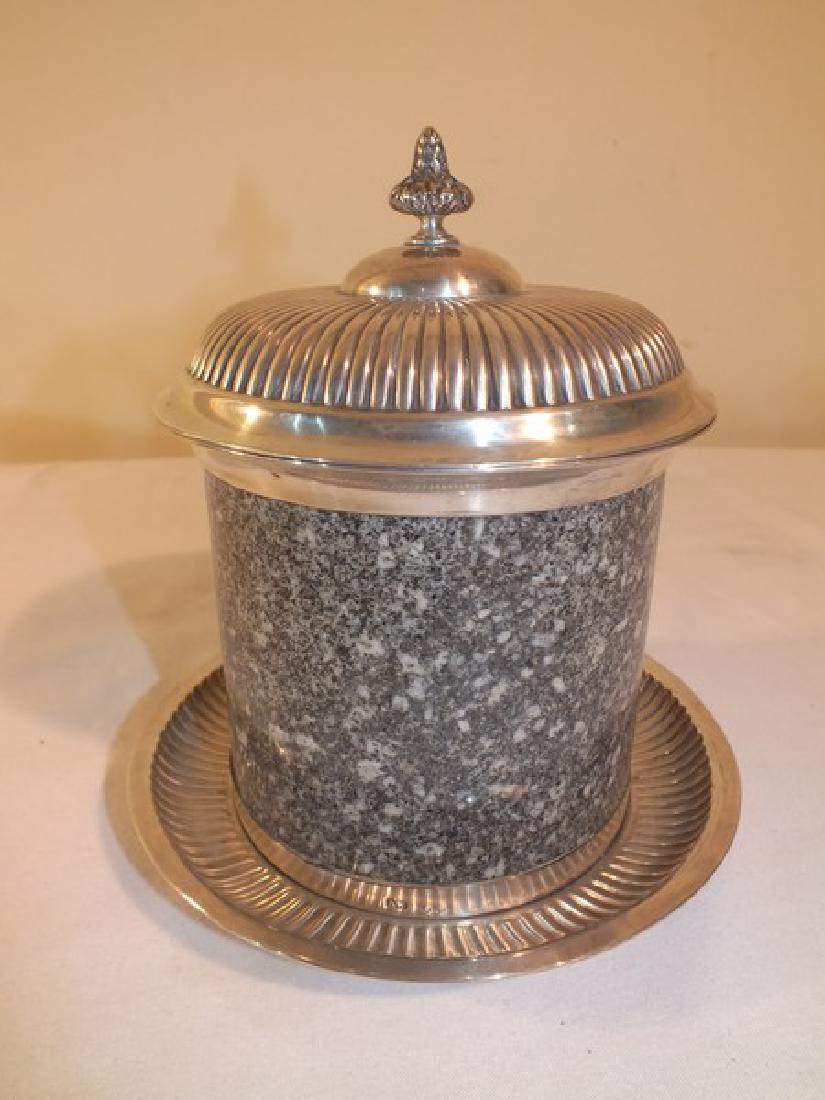STERLING SILVER & GRANITE BISCUIT JAR: Antique British cylindrical granite biscuit jar with hallmarked English sterling silver ribbed mounts, hinged cover, and thistle finial. Maker AW (West and Son) circa early 1900's. Size: 8" tall.