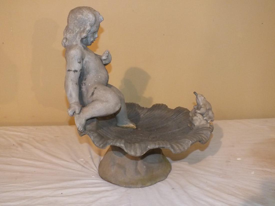 ANTIQUE LEAD FOUNTAIN - GIRL & FROG: Circa early 1900's English lead garden fountain depicting a little girl sitting on edge of shell looking at a frog. 18 in tall x 14 in diameter. Very good condition.