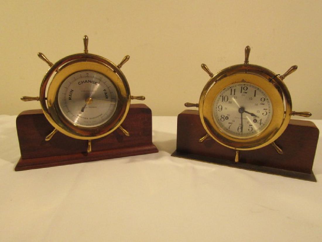 SETH THOMAS SHIPS CLOCK & BAROMETER: Seth Thomas Helmsman model ship's wheel desk clock and matching barometer, 4 in dial, 9 in tall. Brass cases need cleaning. Clock seems to be ticking but not guaranteed.