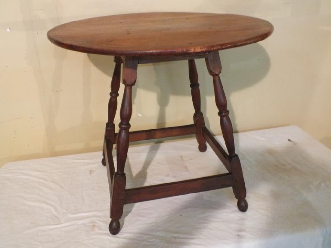 18TH CENTURY ROUND TAVERN TABLE: Circa 1720 maple tavern table with round top, appears all original. 30 in diameter top by 27 inc hes high.