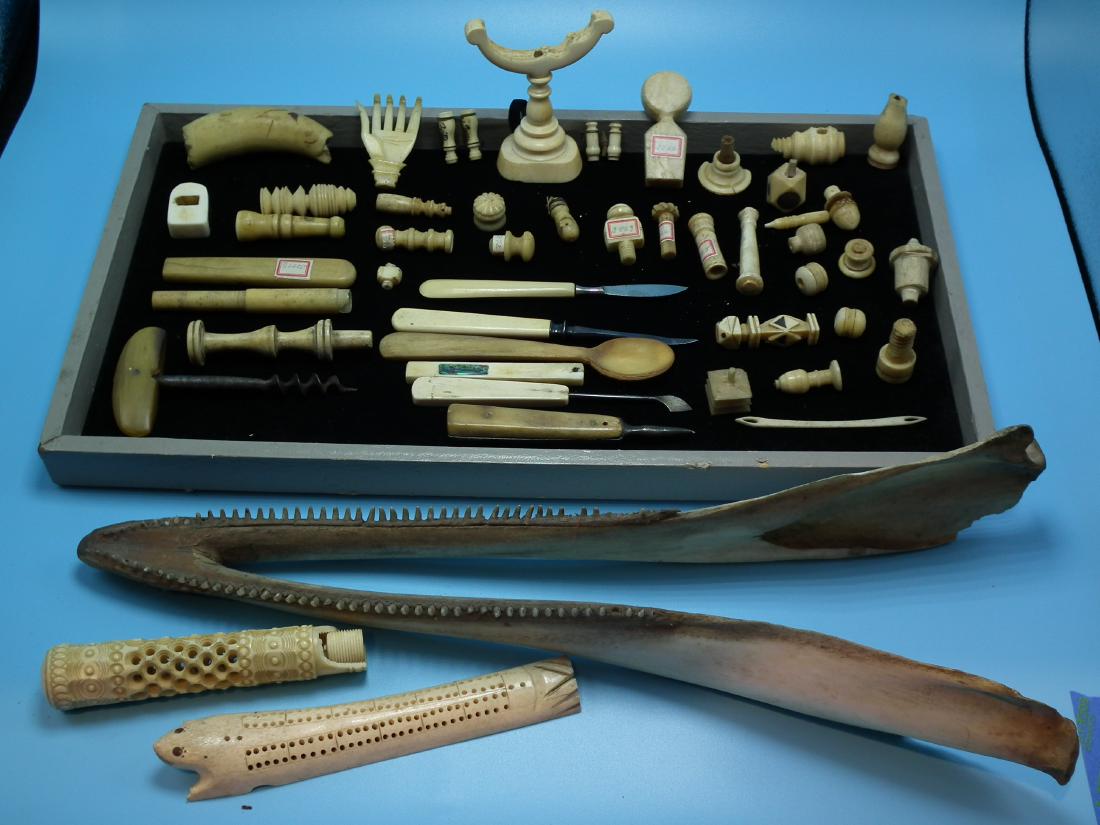 MIXED LOT WHALE BONE & STANHOPES: Large lot 19th century mostly whale bone implements as displayed including: 2 miniature Stanhopes; cuticles; corkscrew; can handle (as is); cribbage game board; mini binoculars; hand back scratcher et